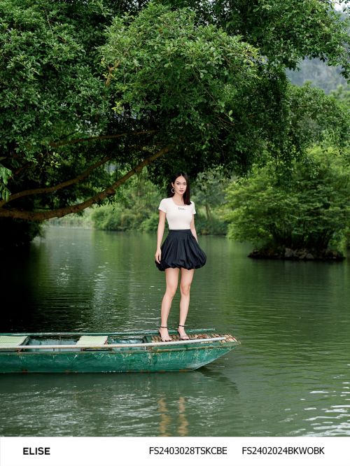CHÂN VÁY THÔ ĐEN BOM GẤU