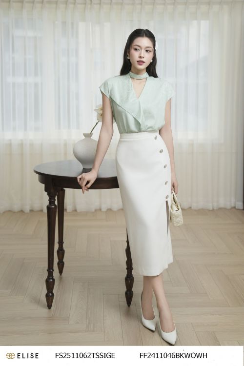 JUPE TRẮNG XẺ BÊN ĐÍNH CÚC