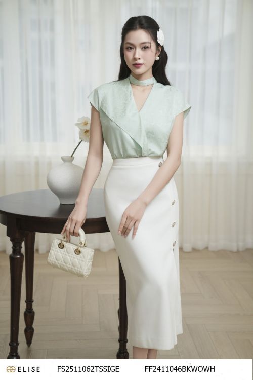 JUPE TRẮNG XẺ BÊN ĐÍNH CÚC