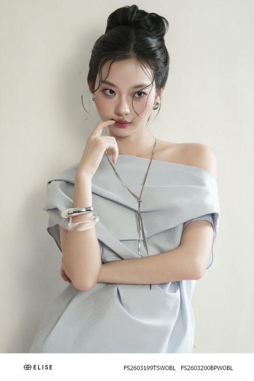 ÁO THÔ GIÓ XANH GHI TRỄ VAI