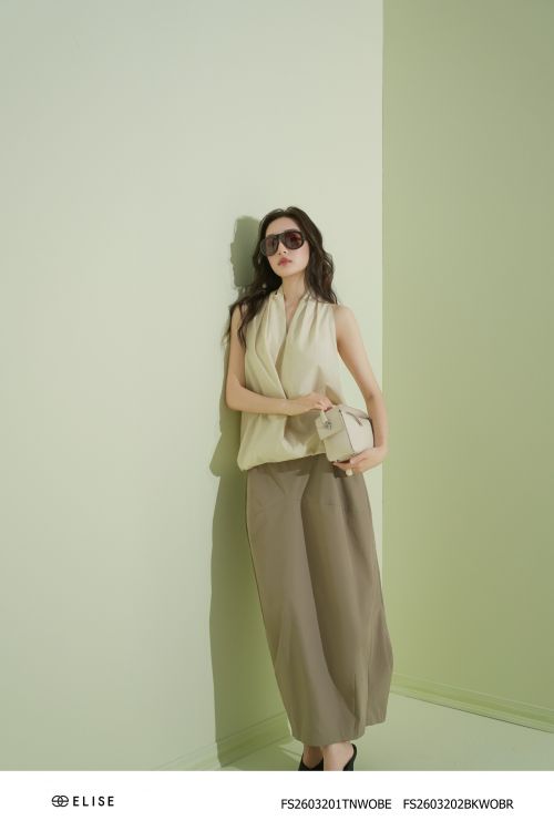 CHÂN VÁY NÂU SẪM BOM GẤU