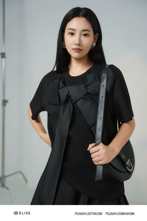 ÁO THUN ĐEN ĐÍNH NƠ NGỰC