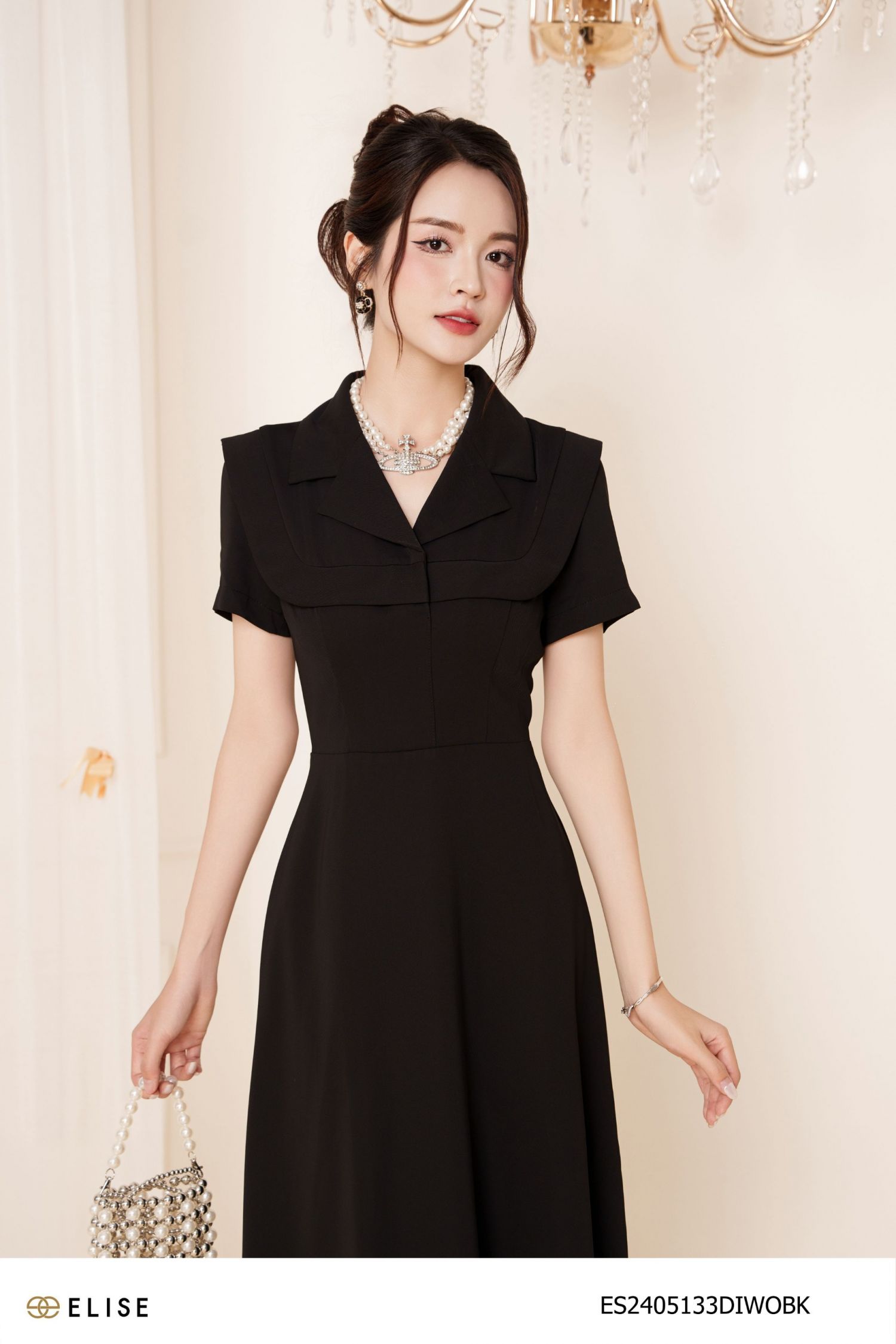 ĐẦM ĐEN CỔ VEST VIỀN CẦU NGỰC