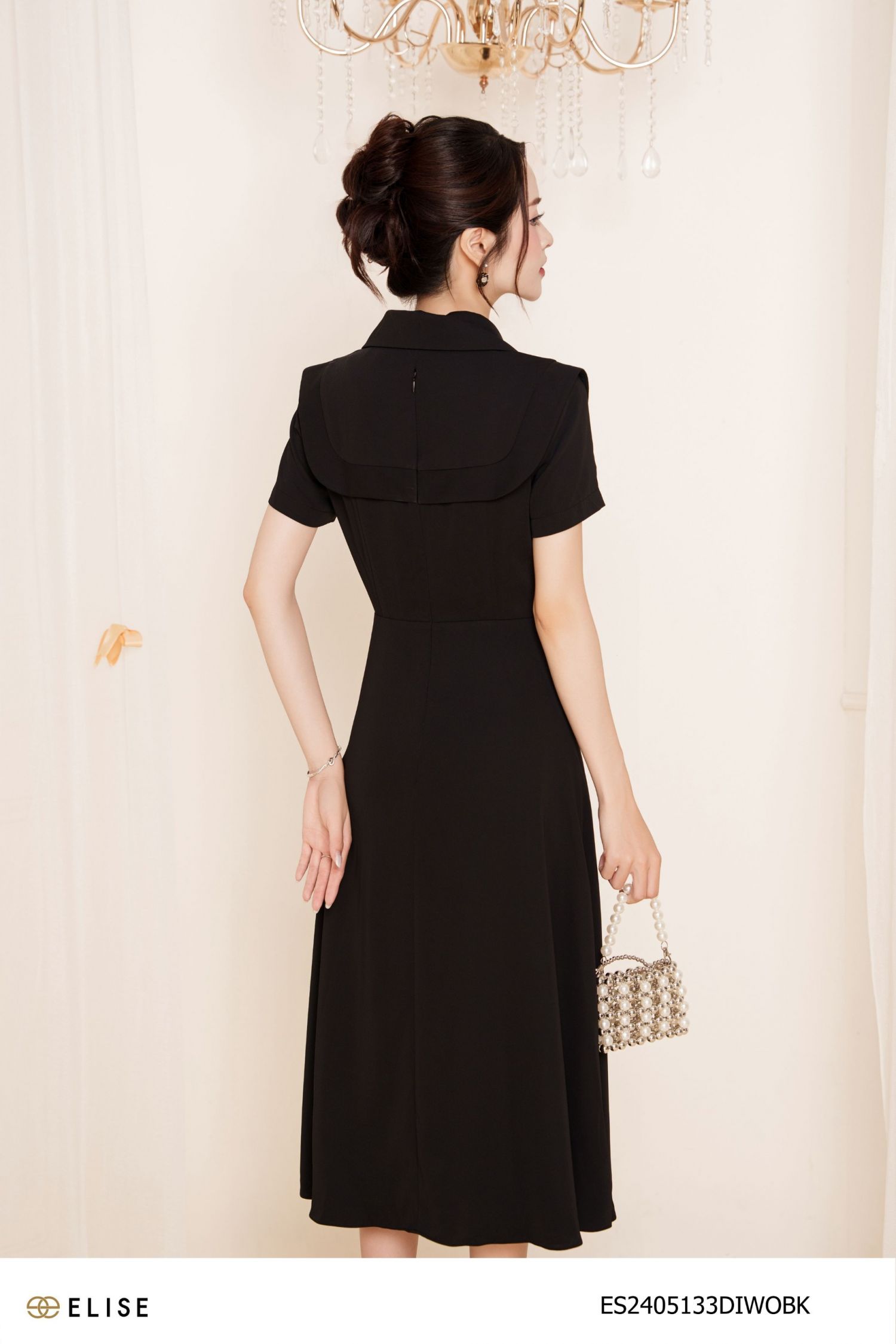 ĐẦM ĐEN CỔ VEST VIỀN CẦU NGỰC