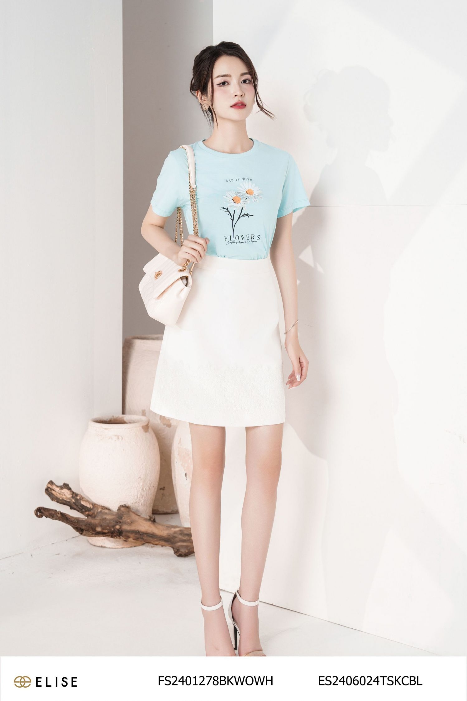JUPE TRẮNG GẤU PHỦ REN HOA