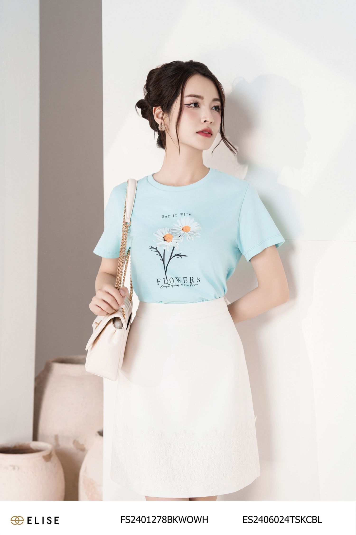JUPE TRẮNG GẤU PHỦ REN HOA