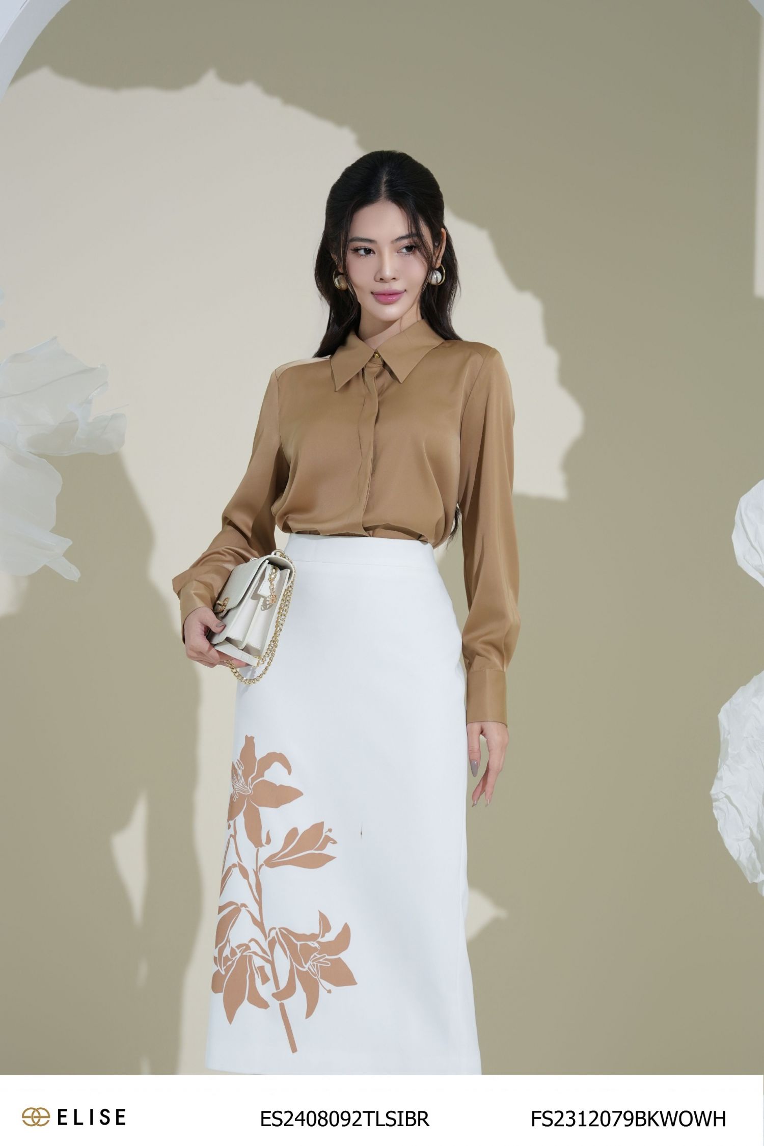 JUPE TRẮNG IN HOA LY