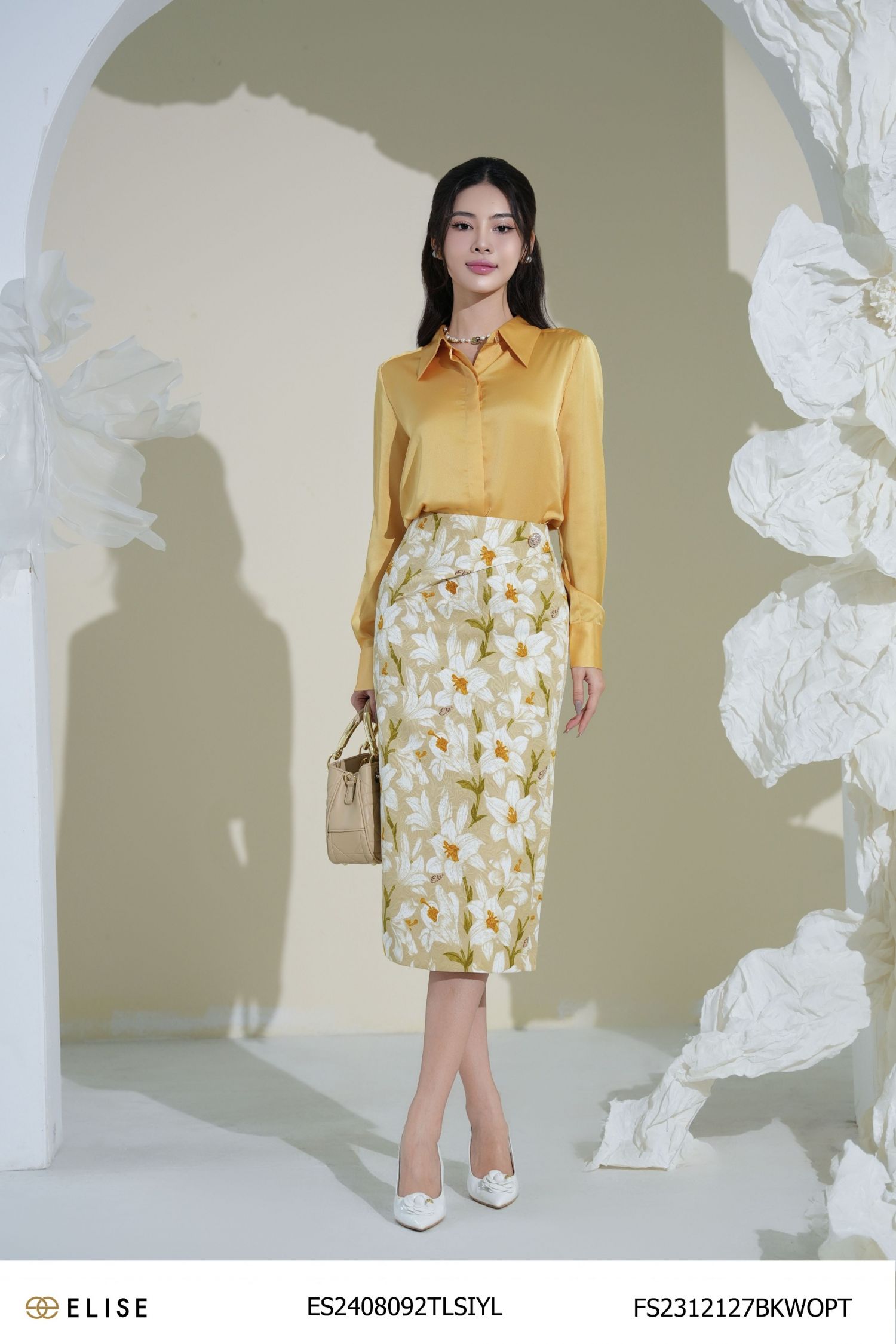 JUPE GẤM HOA LY NỀN BE XẾP LY CHÉO