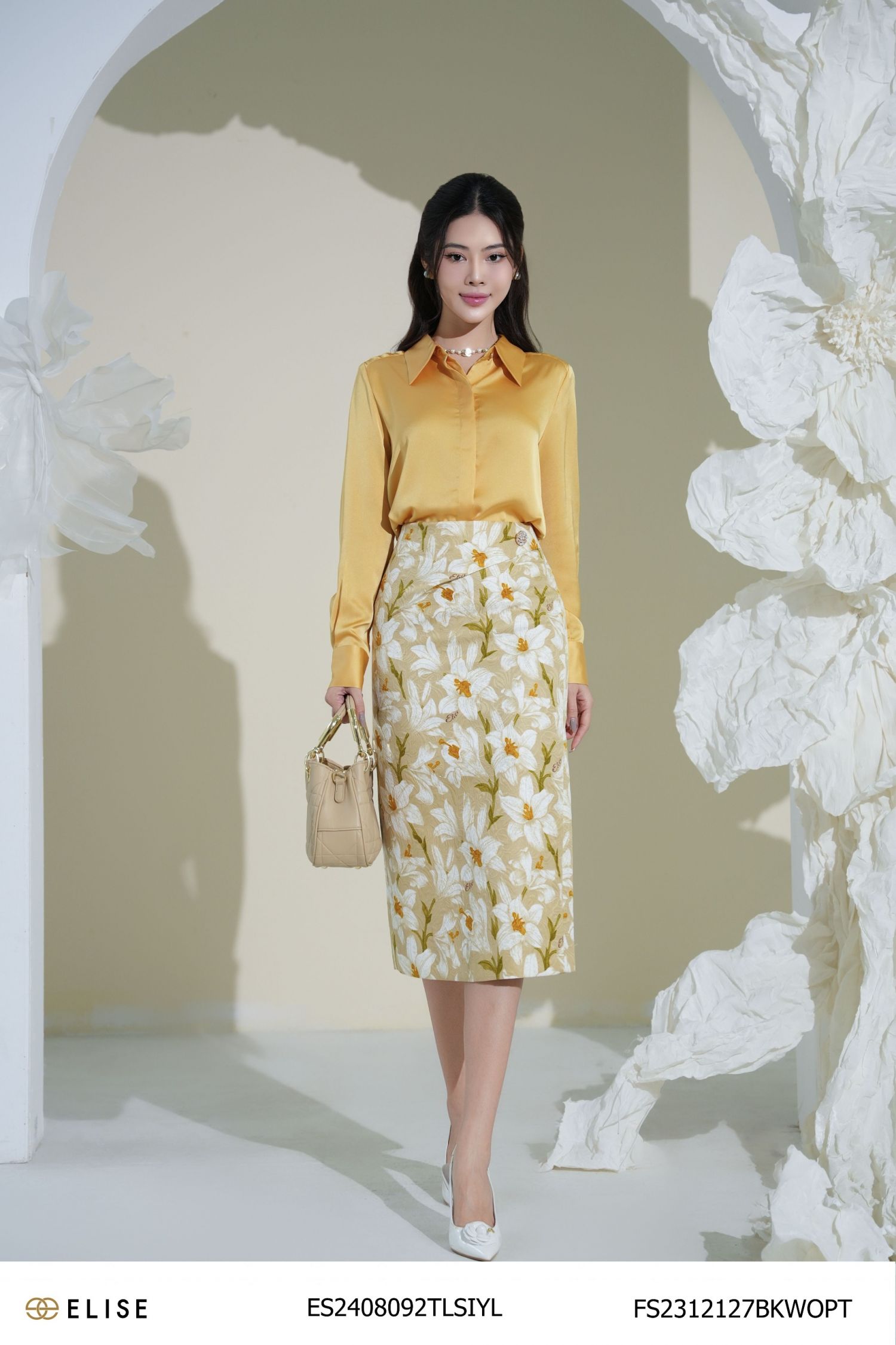 JUPE GẤM HOA LY NỀN BE XẾP LY CHÉO