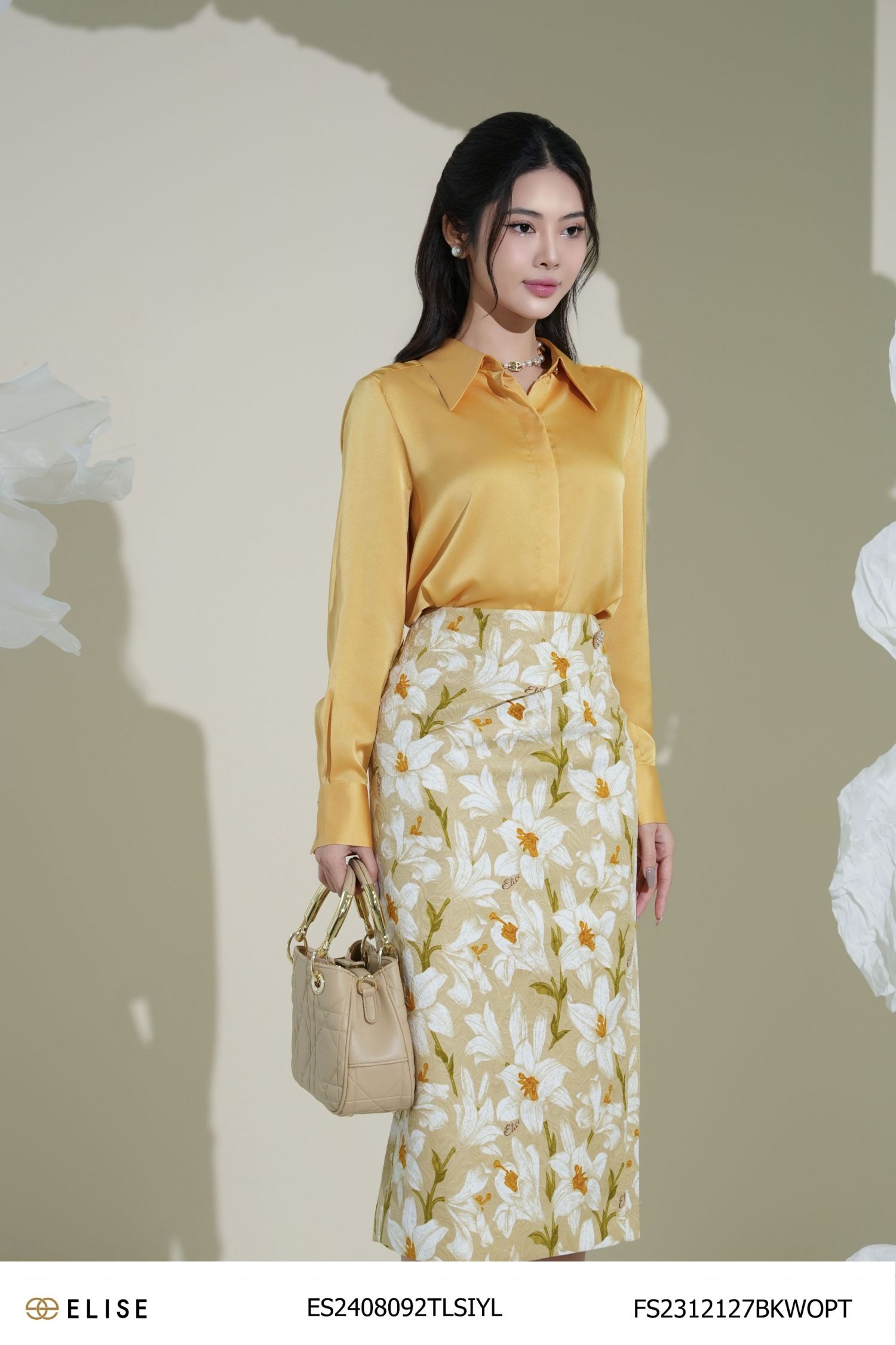 JUPE GẤM HOA LY NỀN BE XẾP LY CHÉO