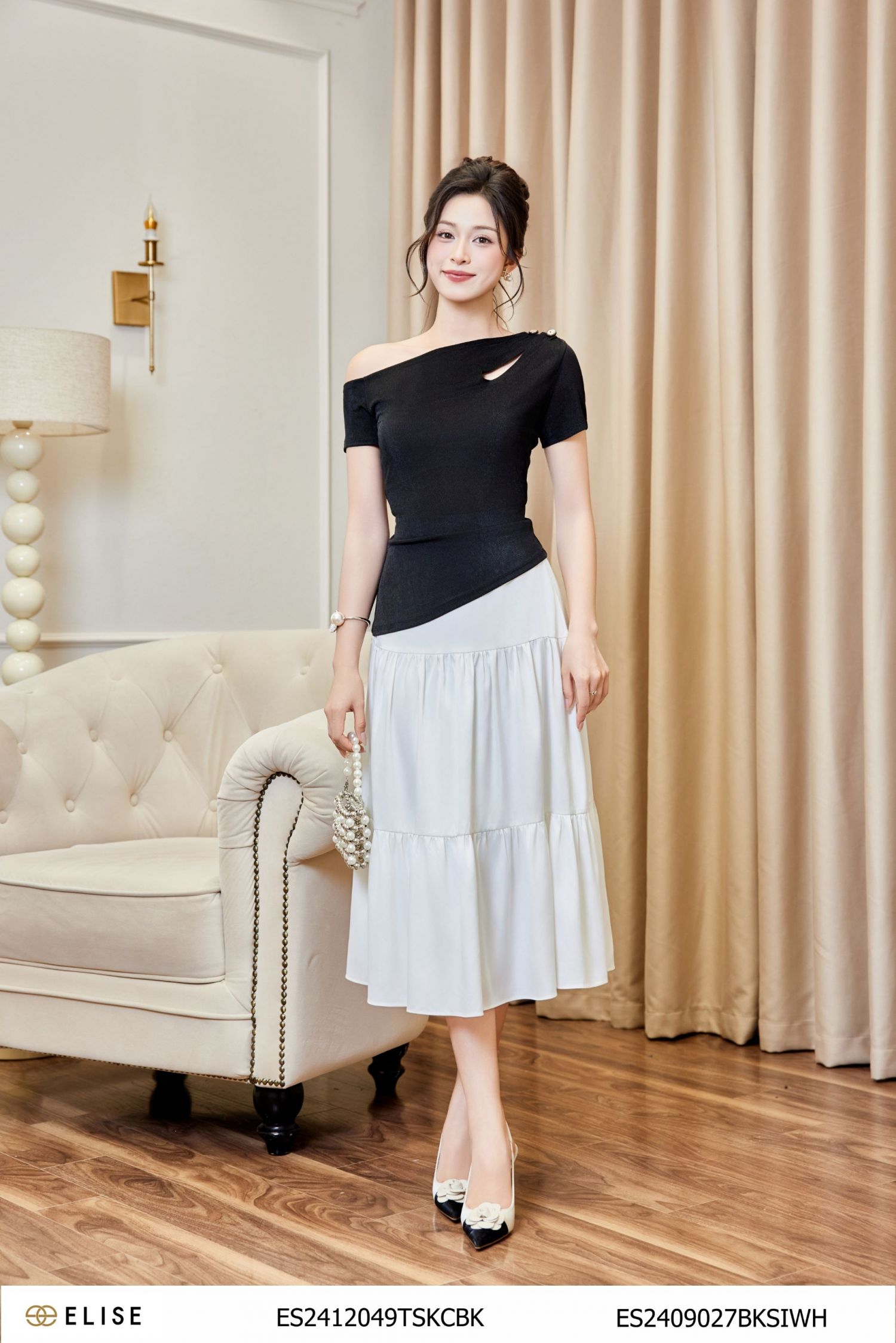ÁO THUN ĐEN CỔ LỆCH NHÚN VAI