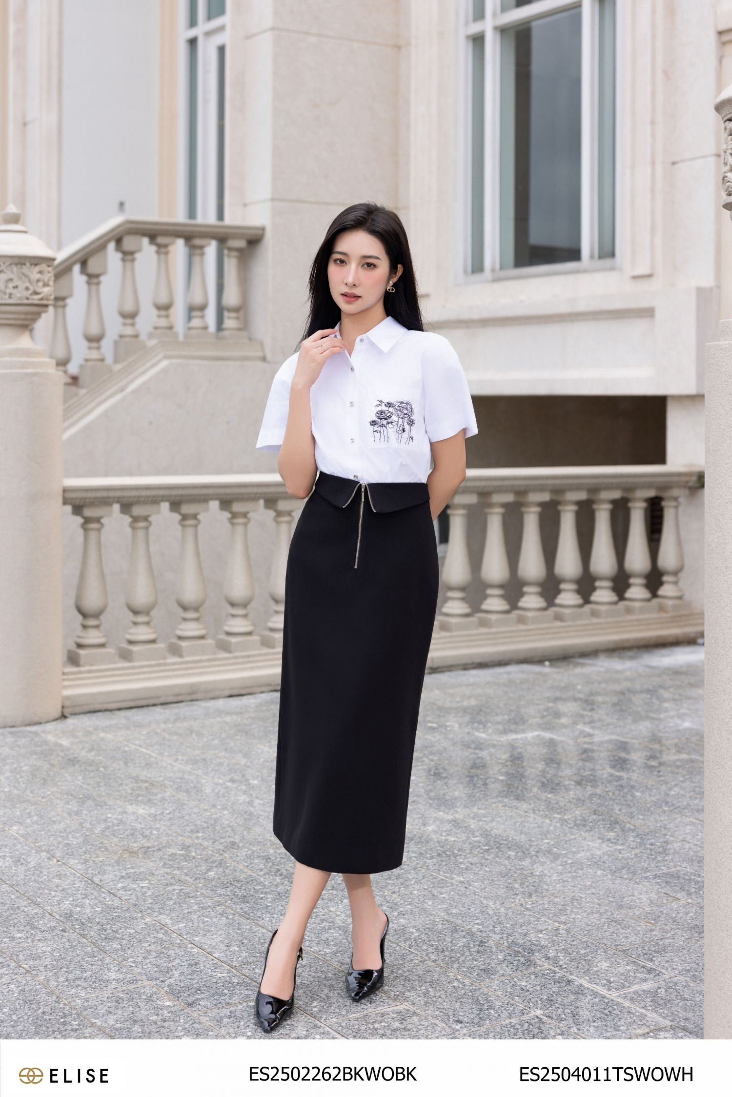 JUPE ĐEN KHÓA ĐỒNG TRƯỚC CẠP LẬT