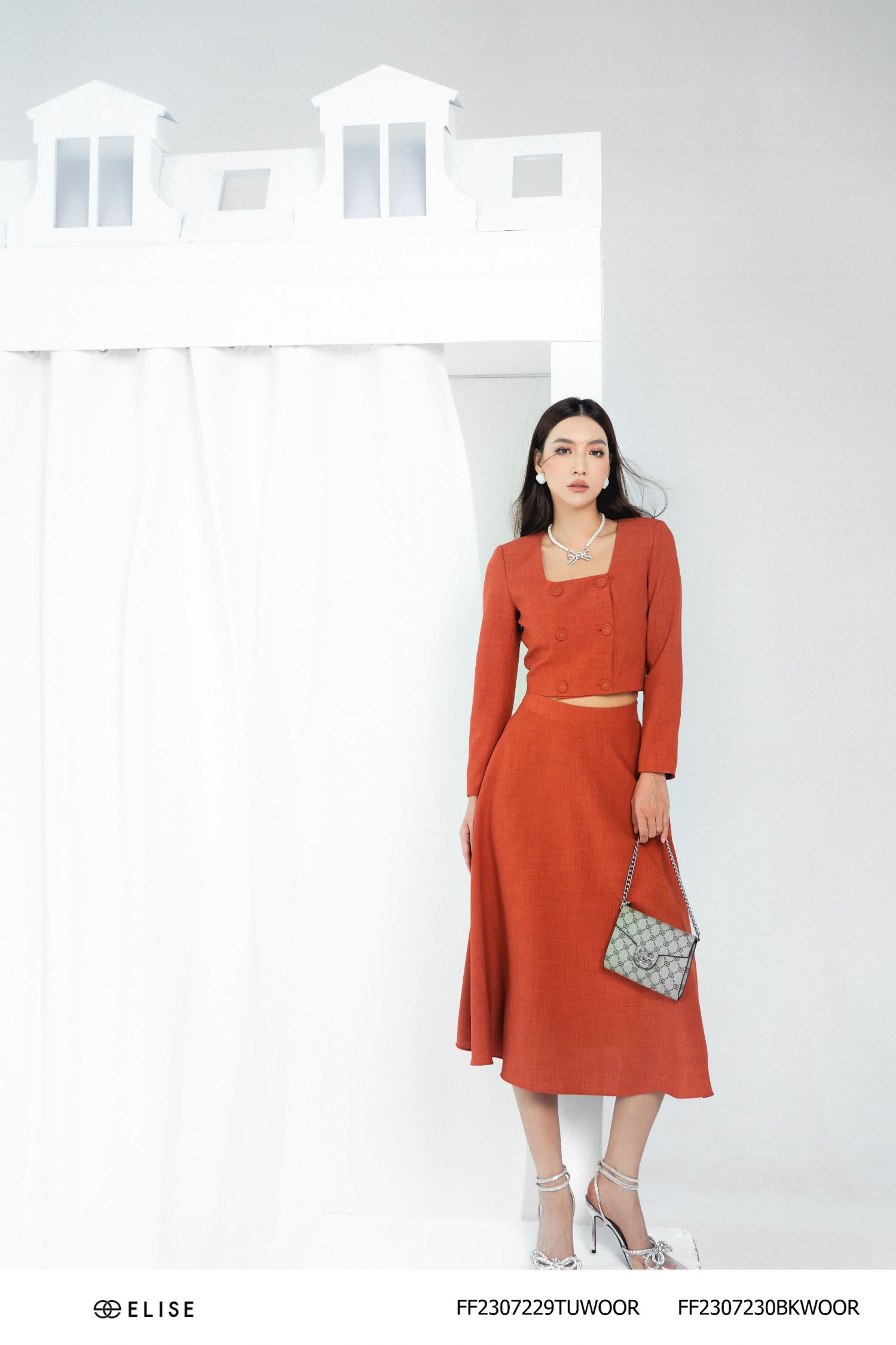 CHÂN VÁY XÒE TWEED CAM ĐẤT