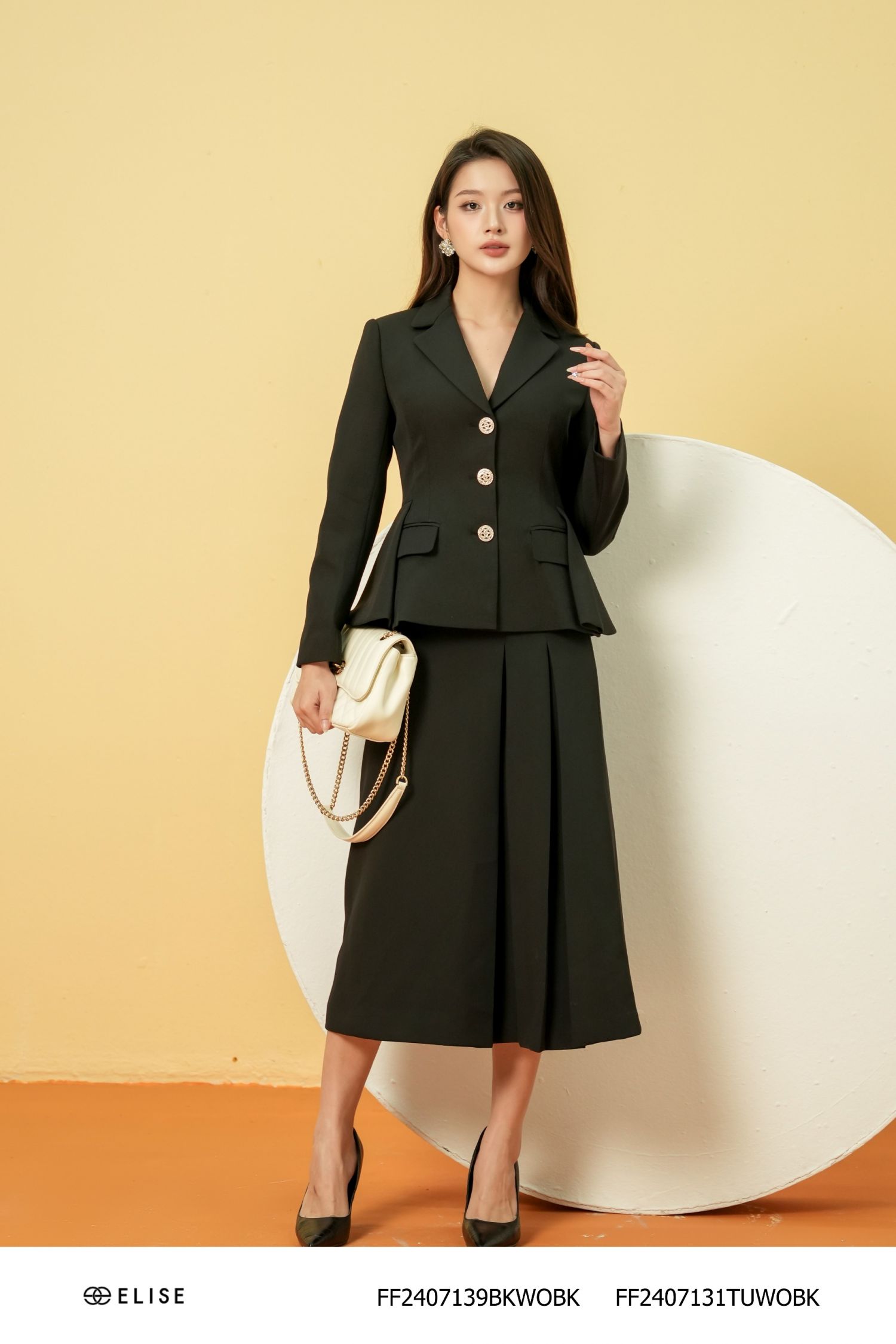 VEST ĐEN EO VẠT XẾP TRÒN