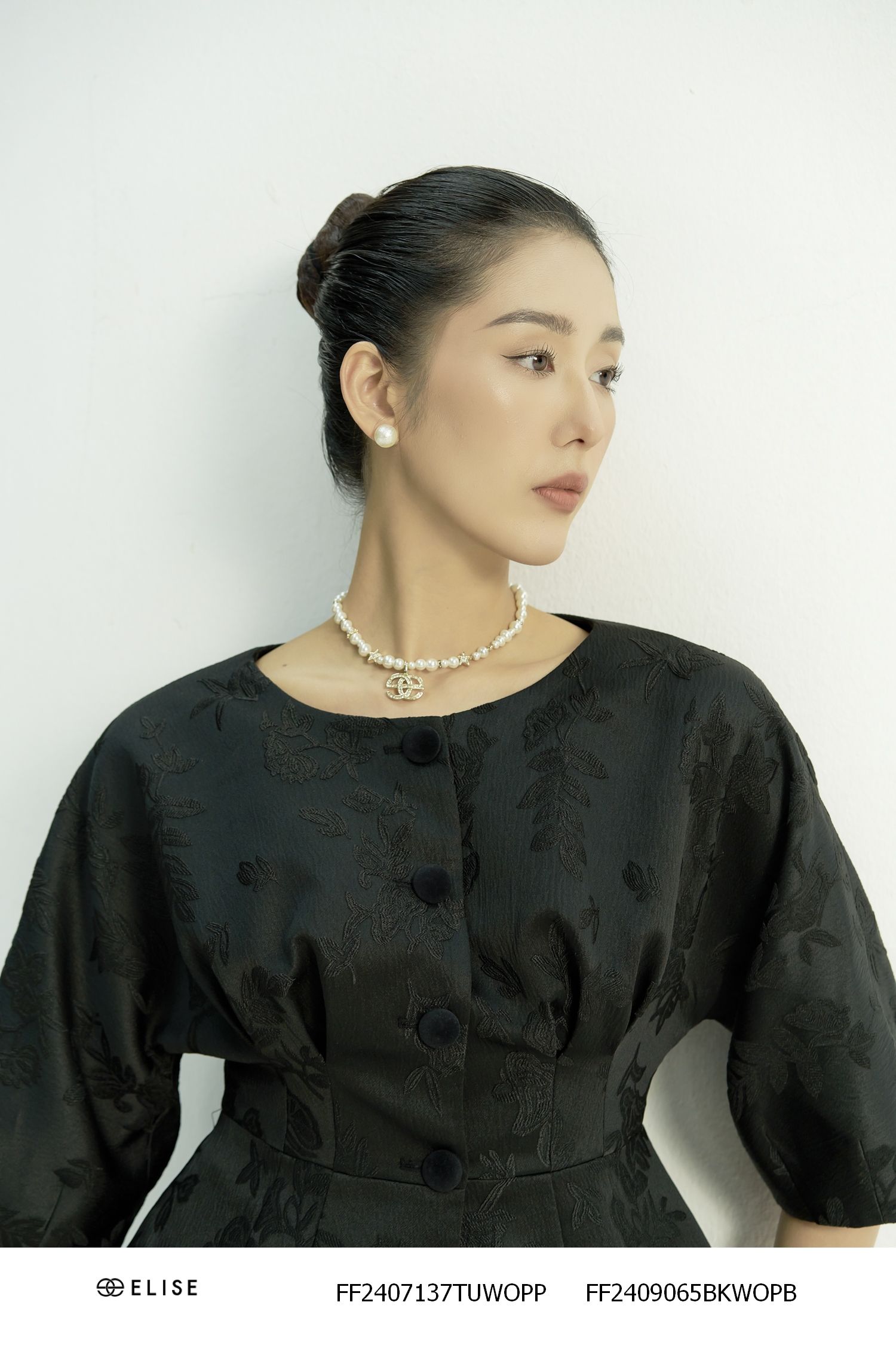 VEST GẤM ĐEN HT LÁ PEPLUM TAY LIỀN