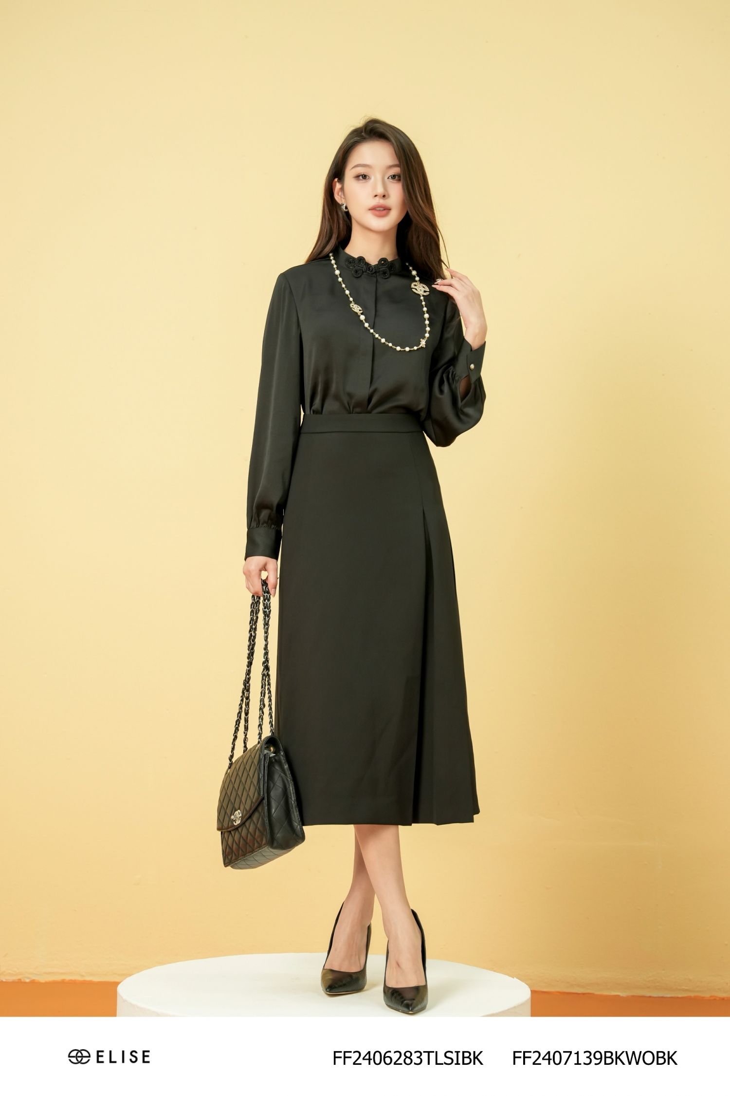 CHÂN VÁY ĐEN XẾP LY BÊN