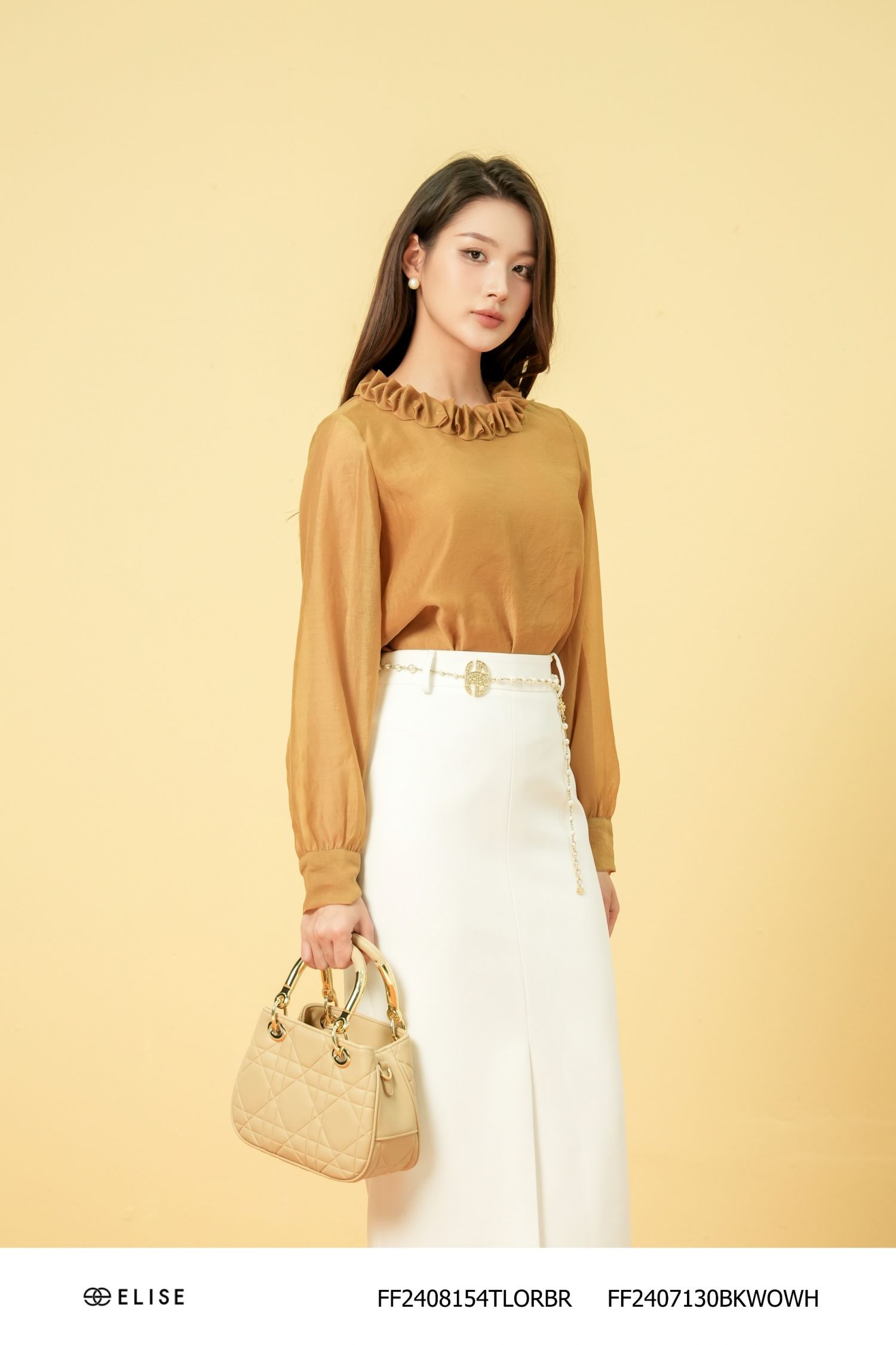 ÁO TƠ NÂU SÁNG XẾP NHÚN LY CỔ