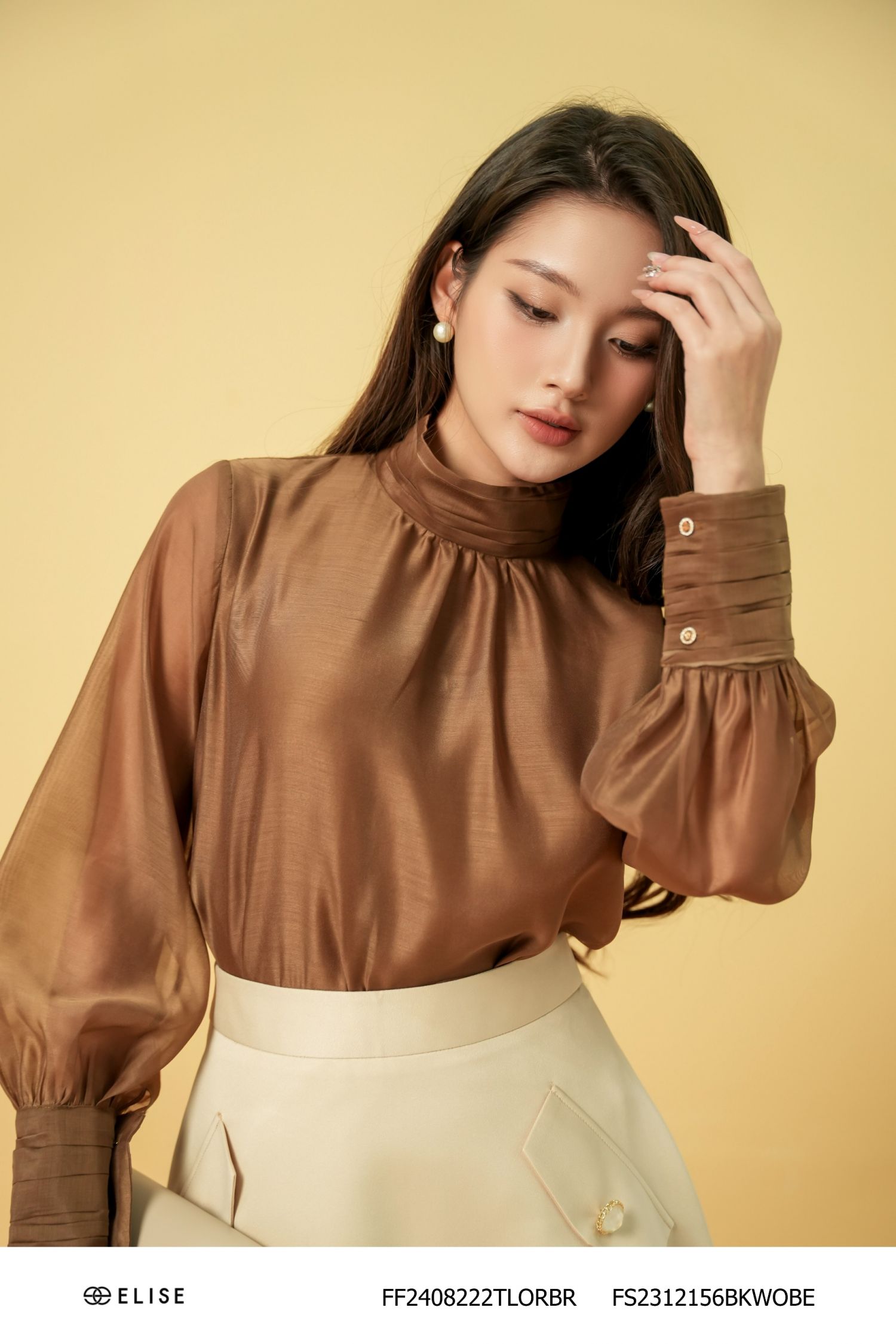 ÁO TƠ NÂU CỔ CAO XẾP NHÚN