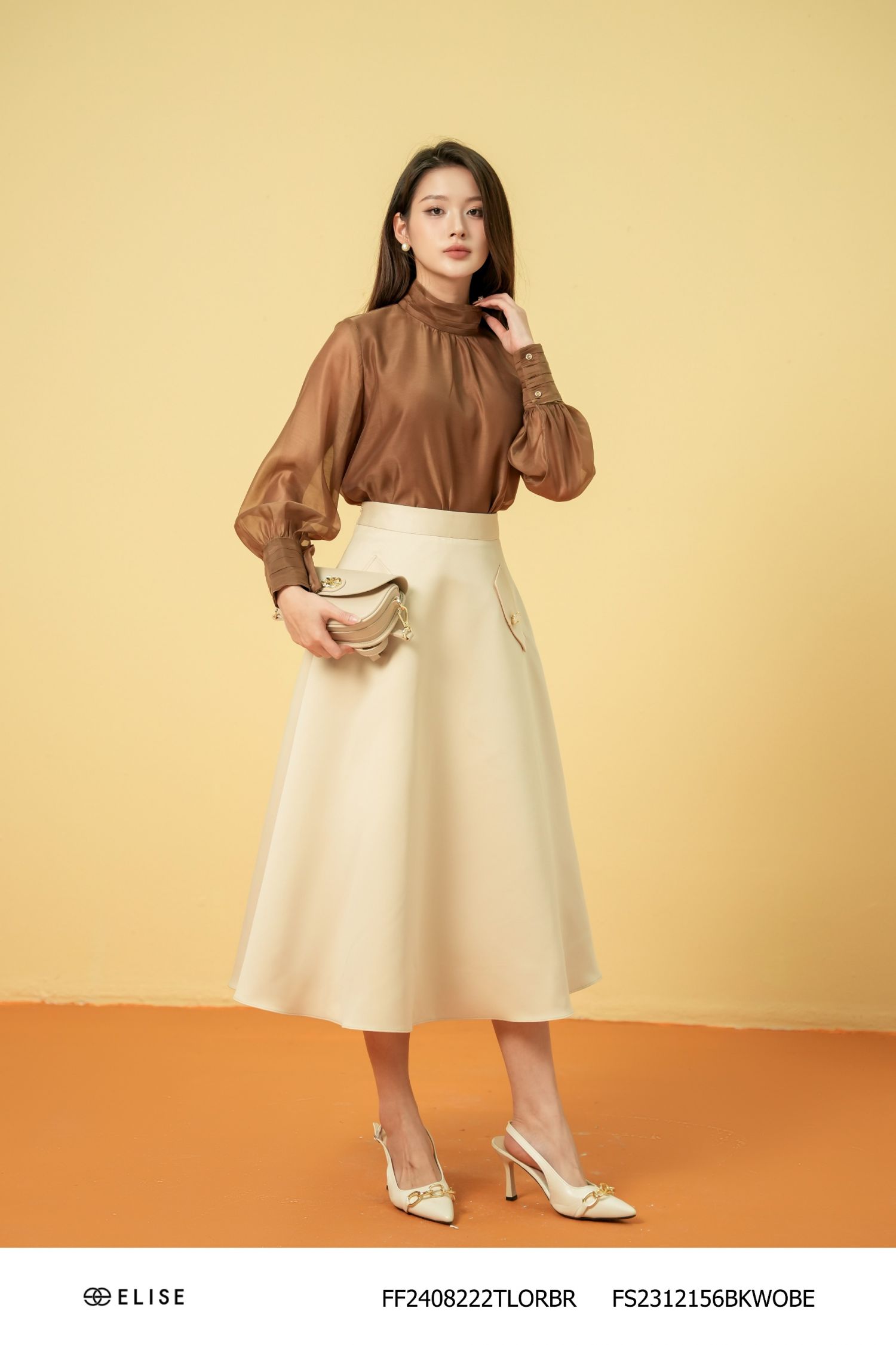 ÁO TƠ NÂU CỔ CAO XẾP NHÚN