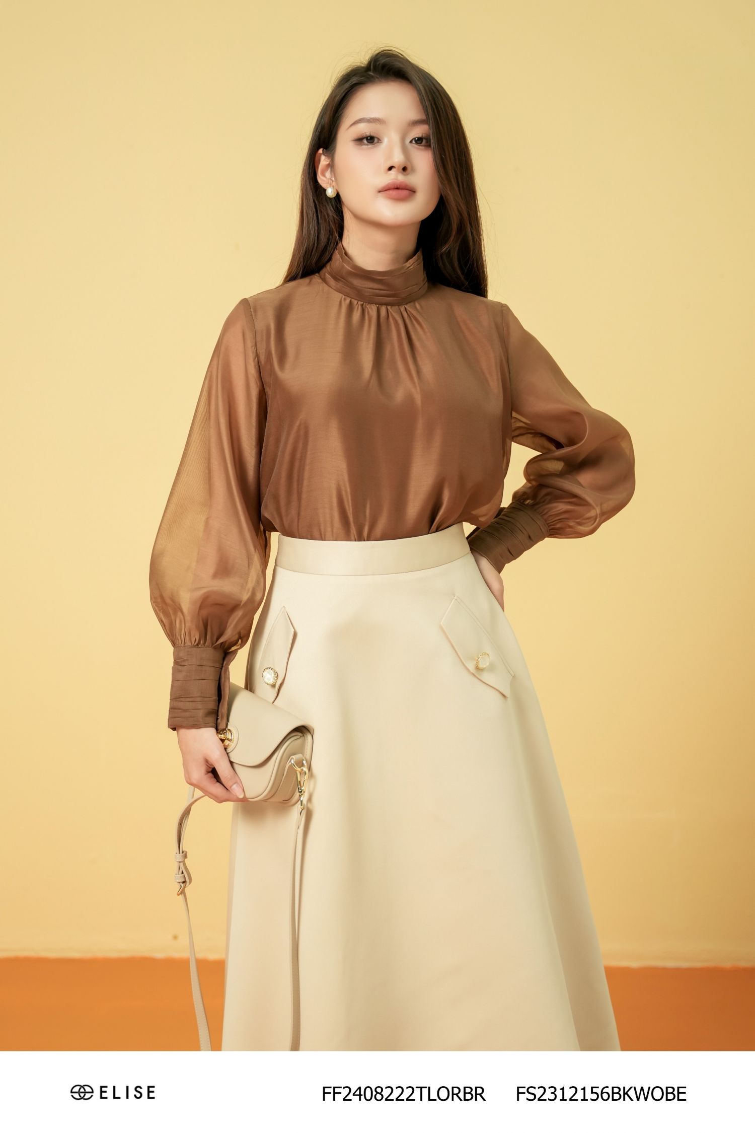 ÁO TƠ NÂU CỔ CAO XẾP NHÚN