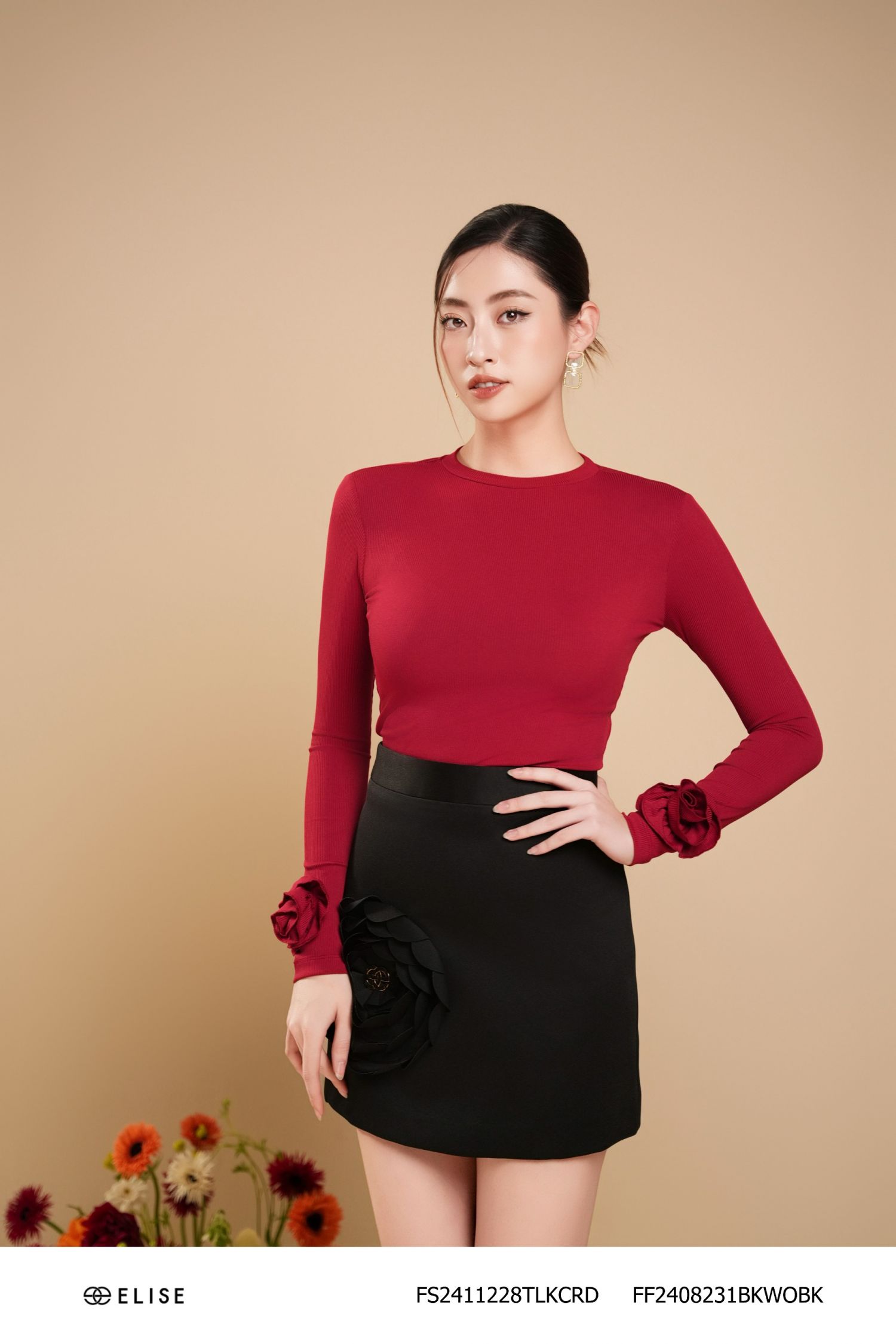 JUPE TAFTA ĐEN XẾP HOA NHỤY LOGO