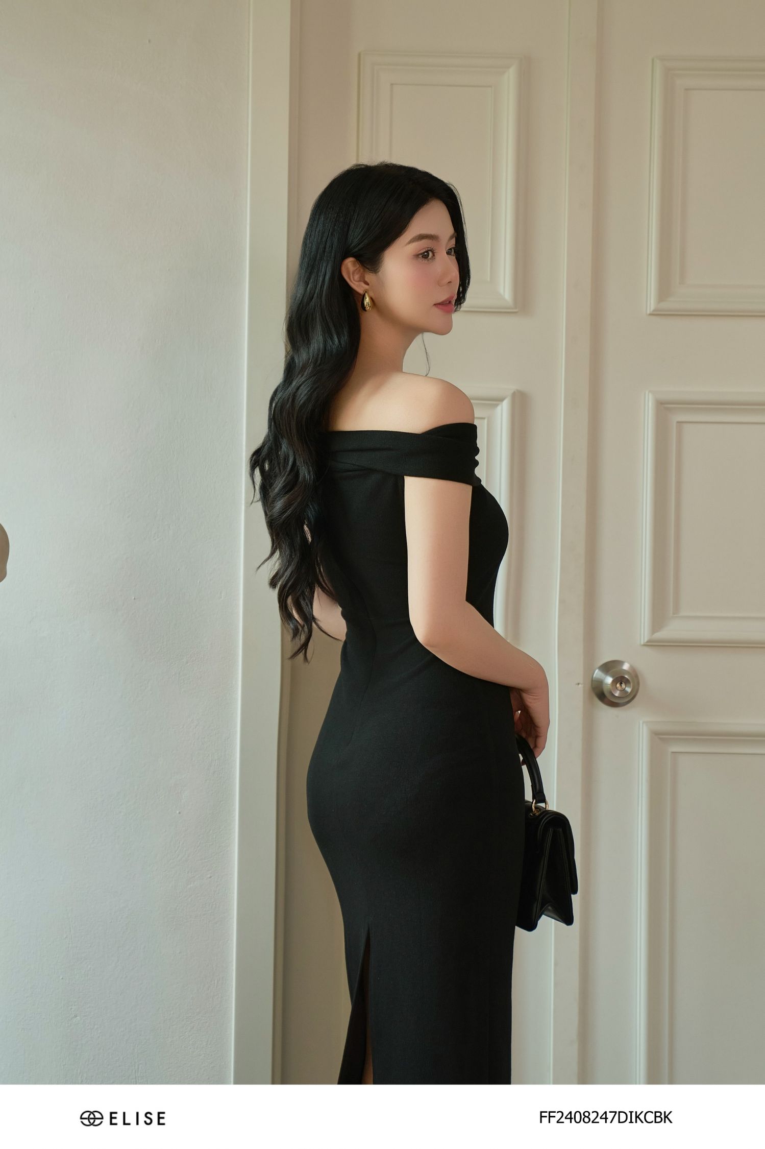 ĐẦM THUN ĐEN TRỄ VAI CÀI HOA
