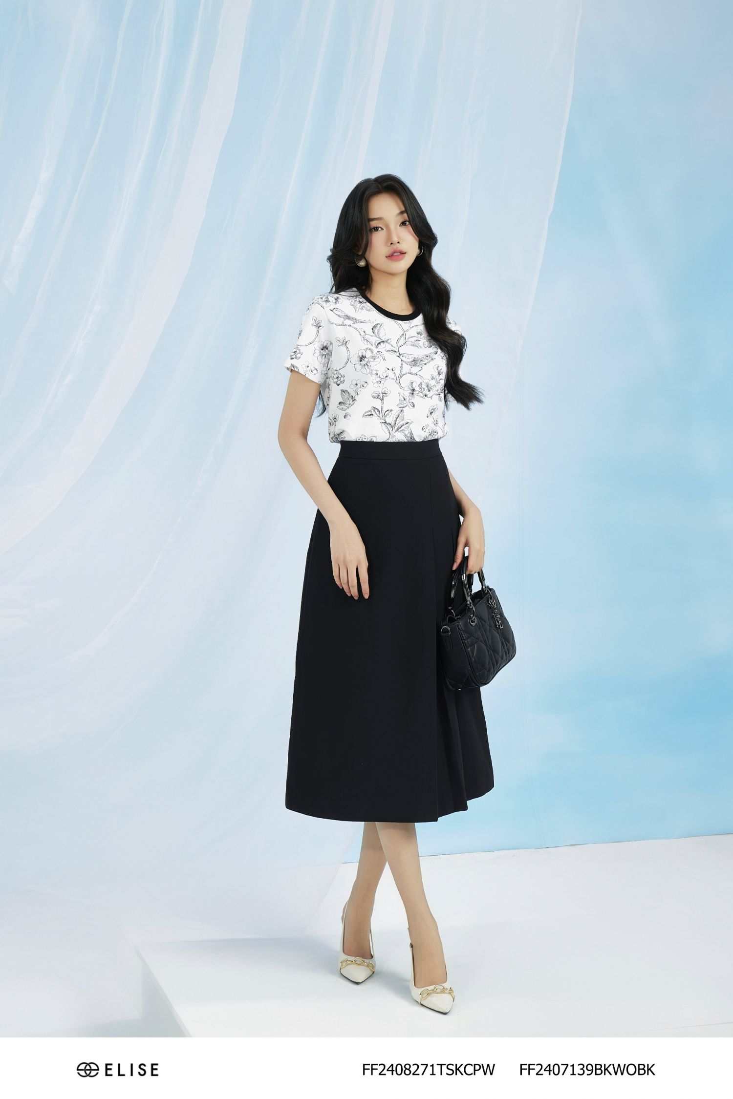 ÁO THUN NỀN TRẮNG HỌA TIẾT ĐEN