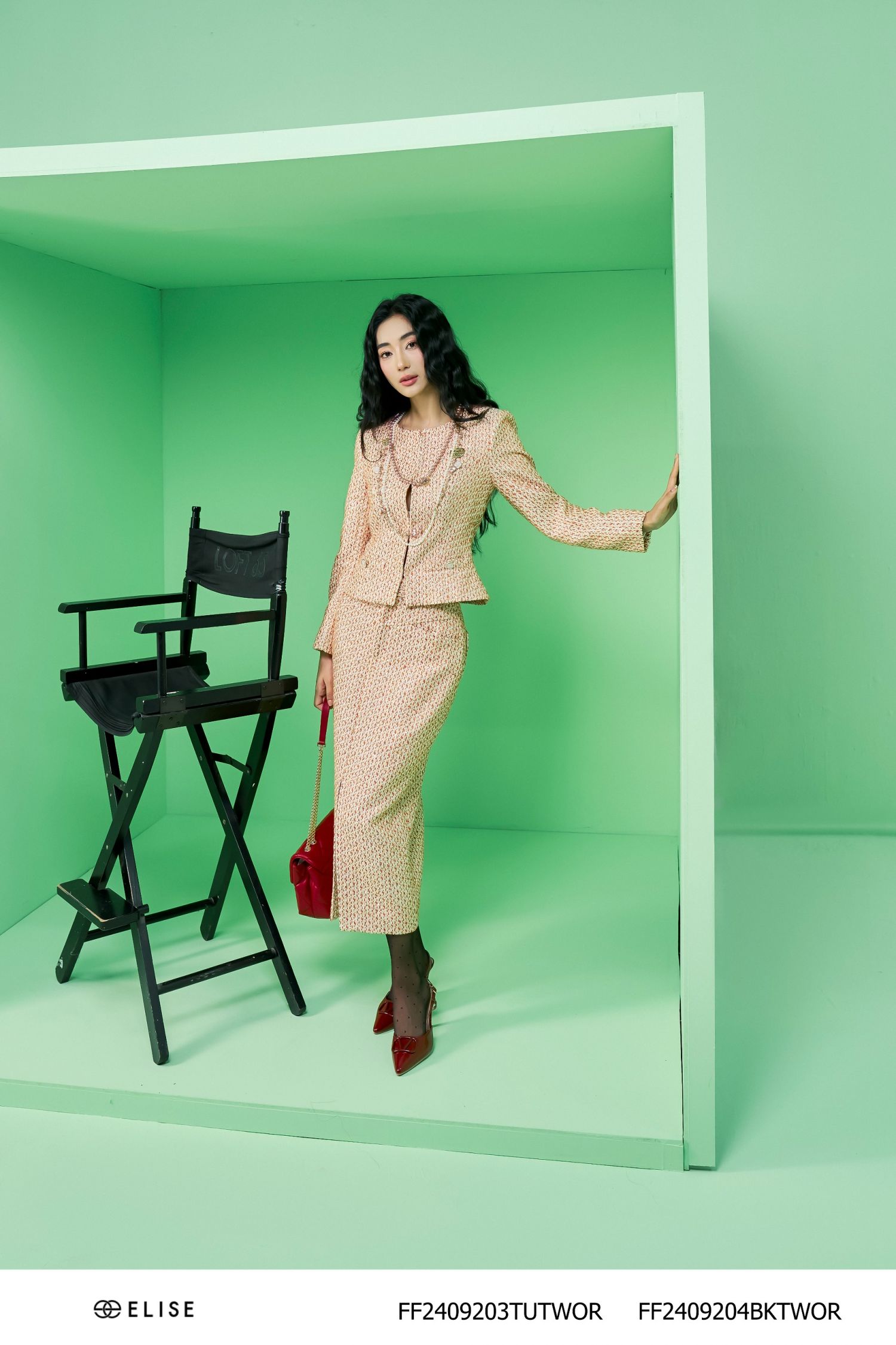 JUPE TWEED CAM NỀN BE KT XẺ TRƯỚC