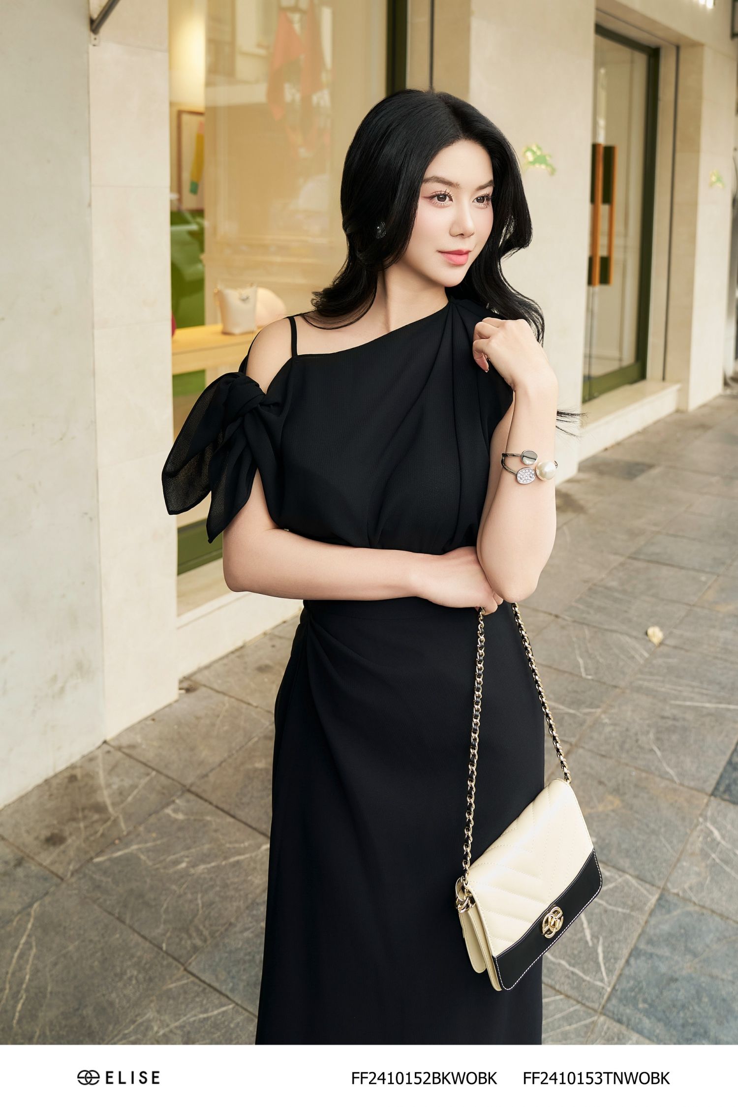 ÁO ĐEN LỆCH VAI MỞ TÀ