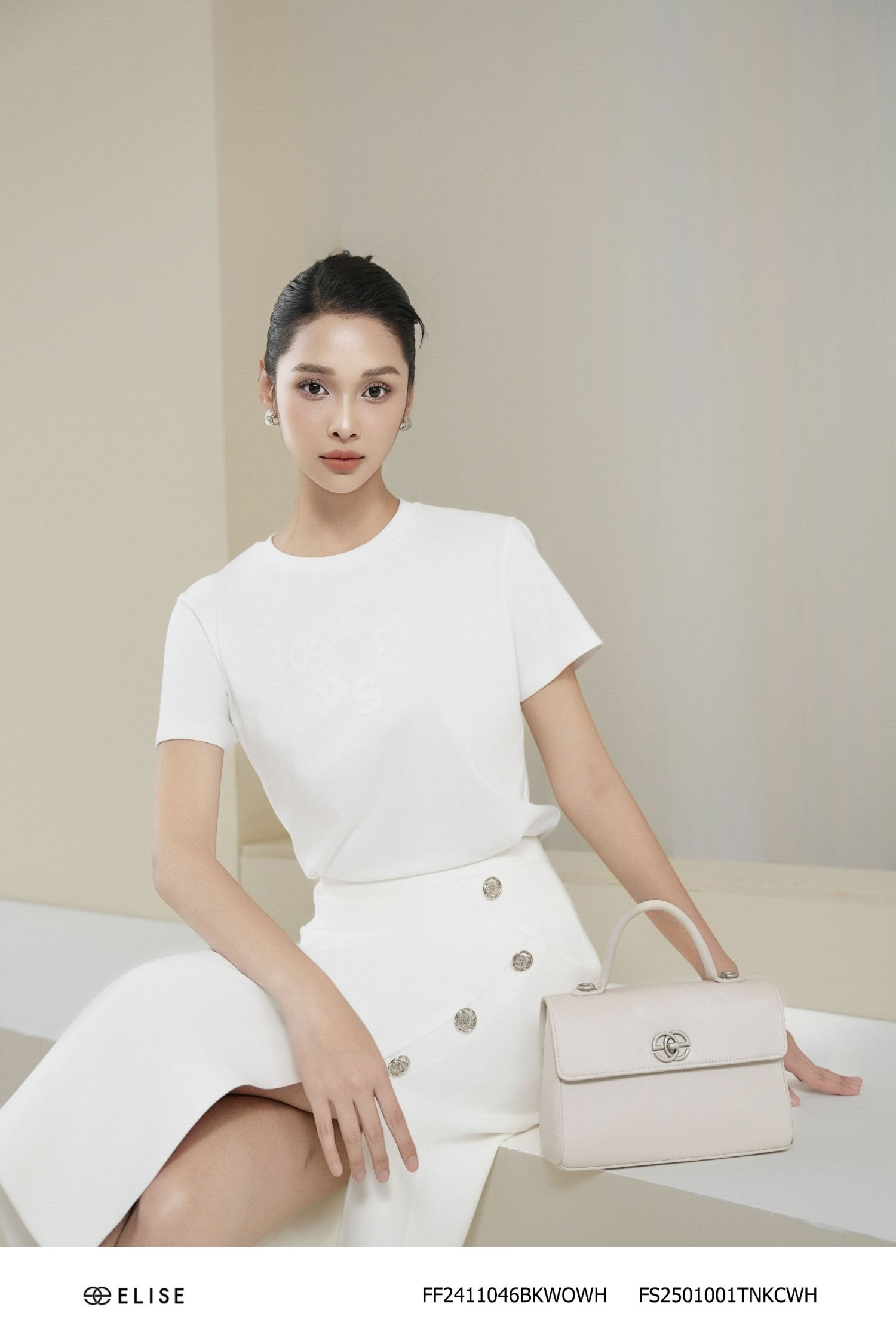 JUPE TRẮNG XẺ BÊN ĐÍNH CÚC