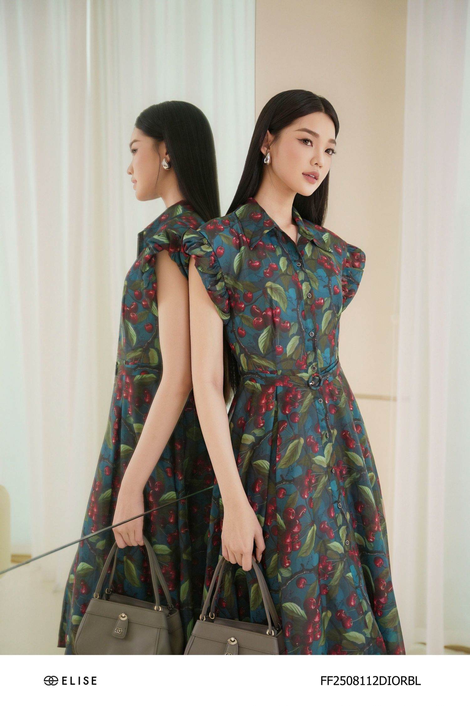 ĐẦM TƠ XANH HT TAY NHÚN PHỒNG ĐAI EO
