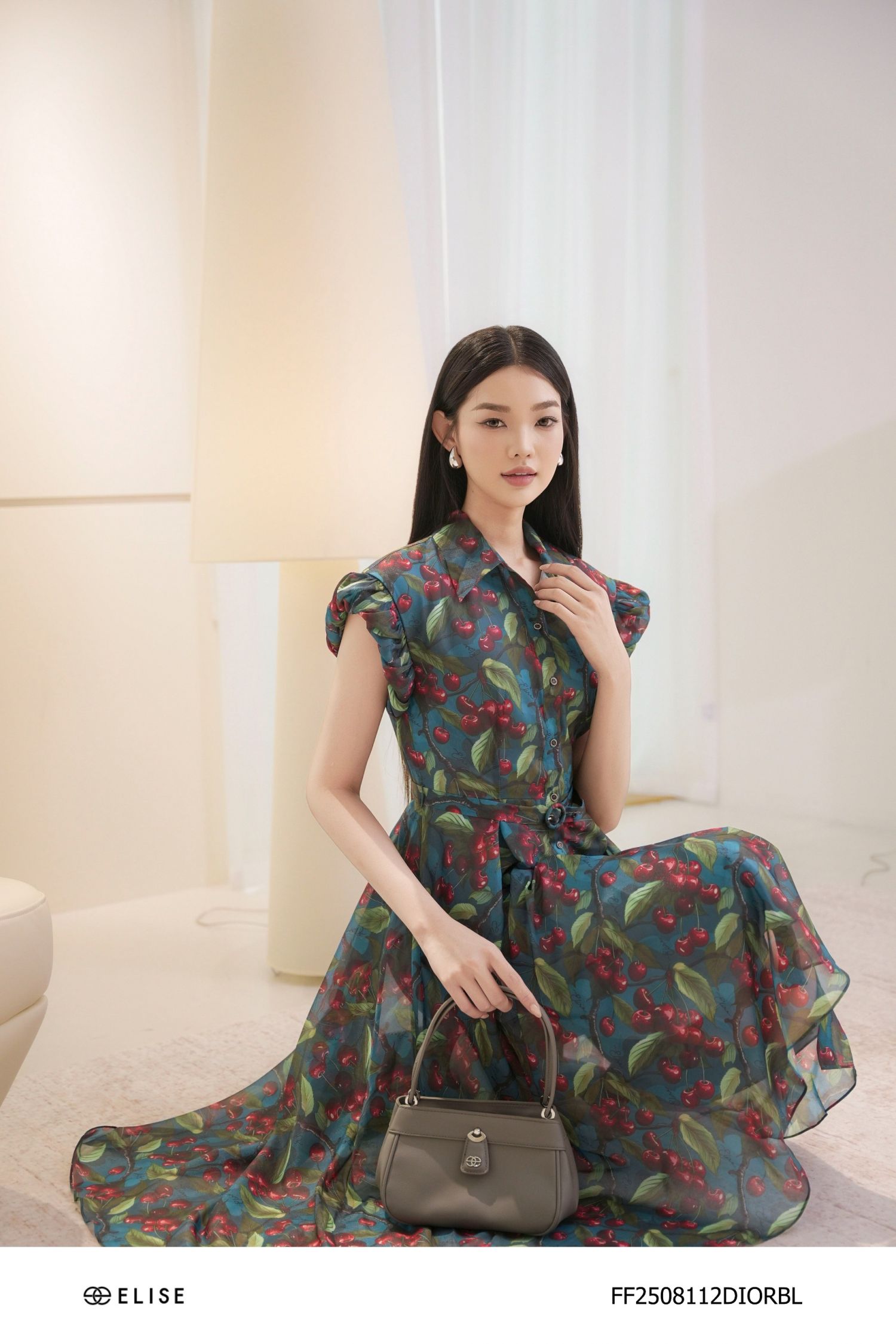 ĐẦM TƠ XANH HT TAY NHÚN PHỒNG ĐAI EO