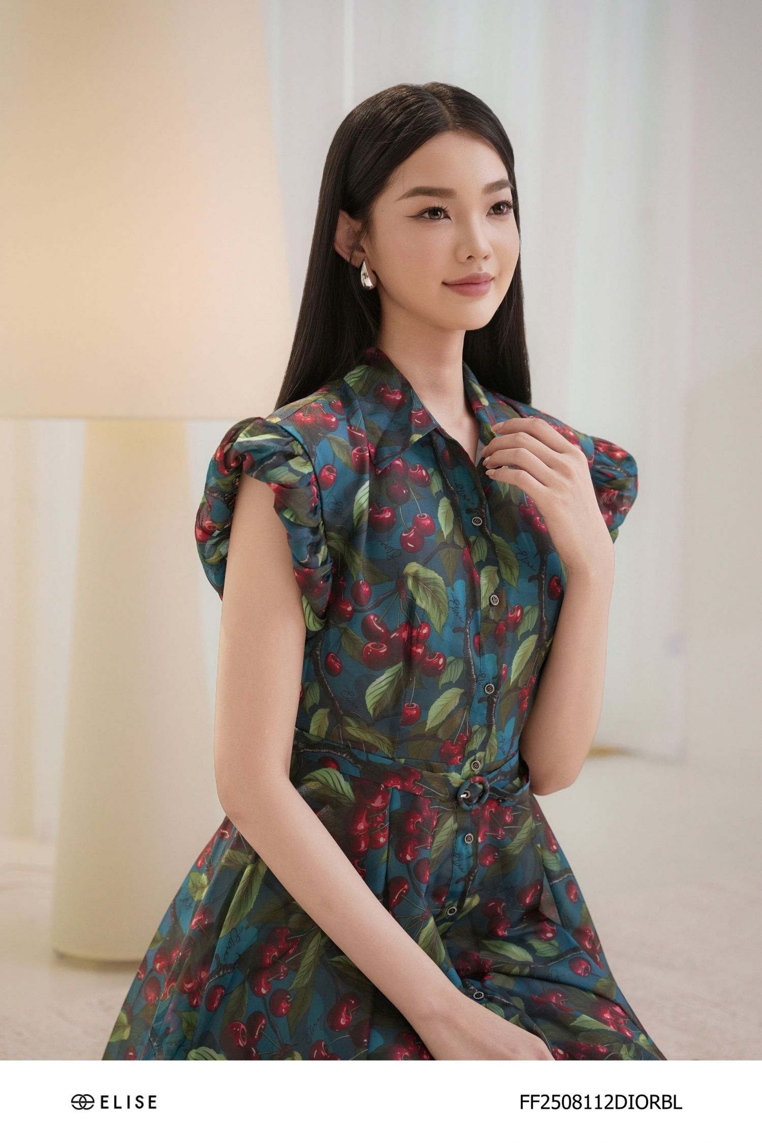ĐẦM TƠ XANH HT TAY NHÚN PHỒNG ĐAI EO