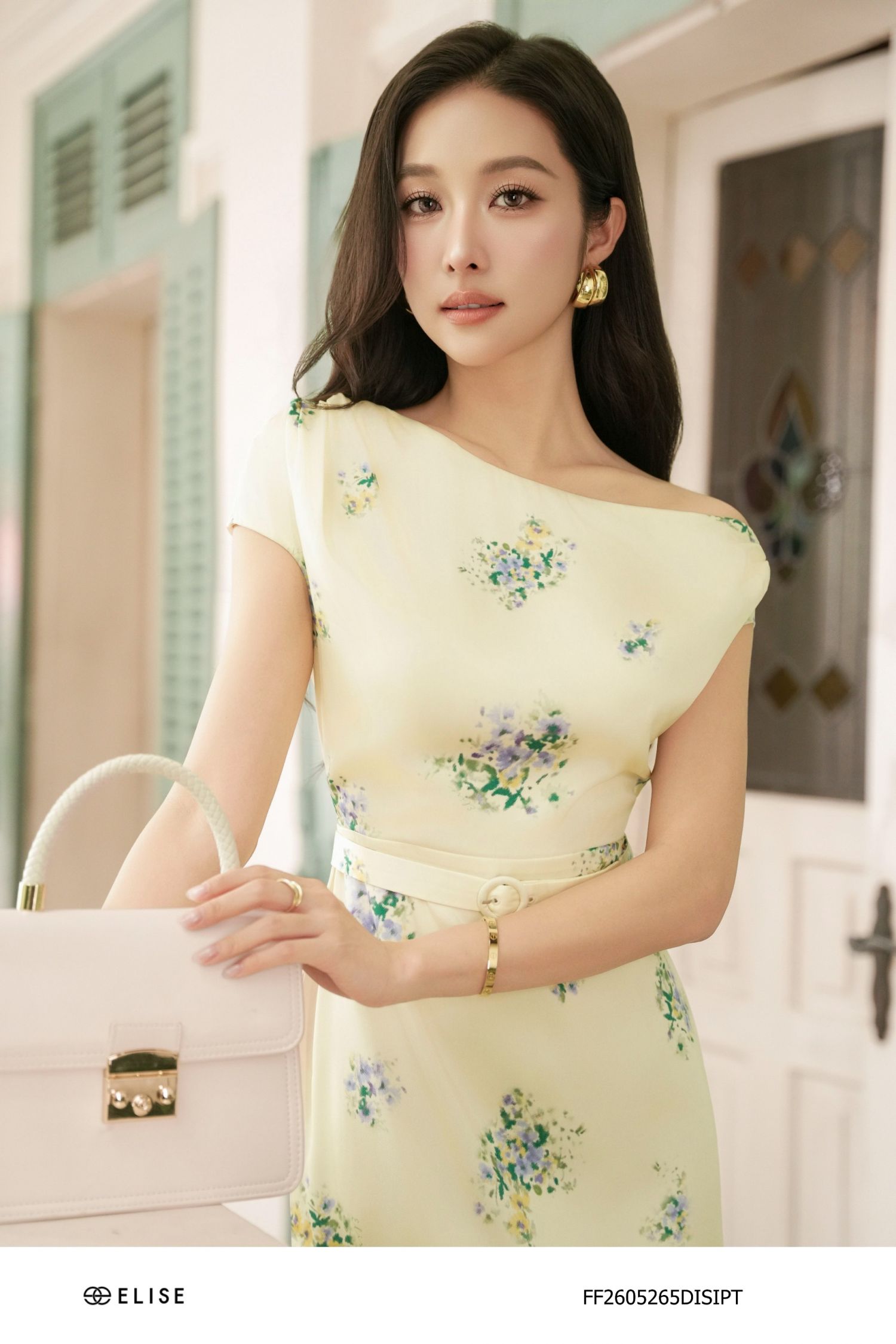 ĐẦM LỤA KEM HT HOA NHÍ VAI LỆCH