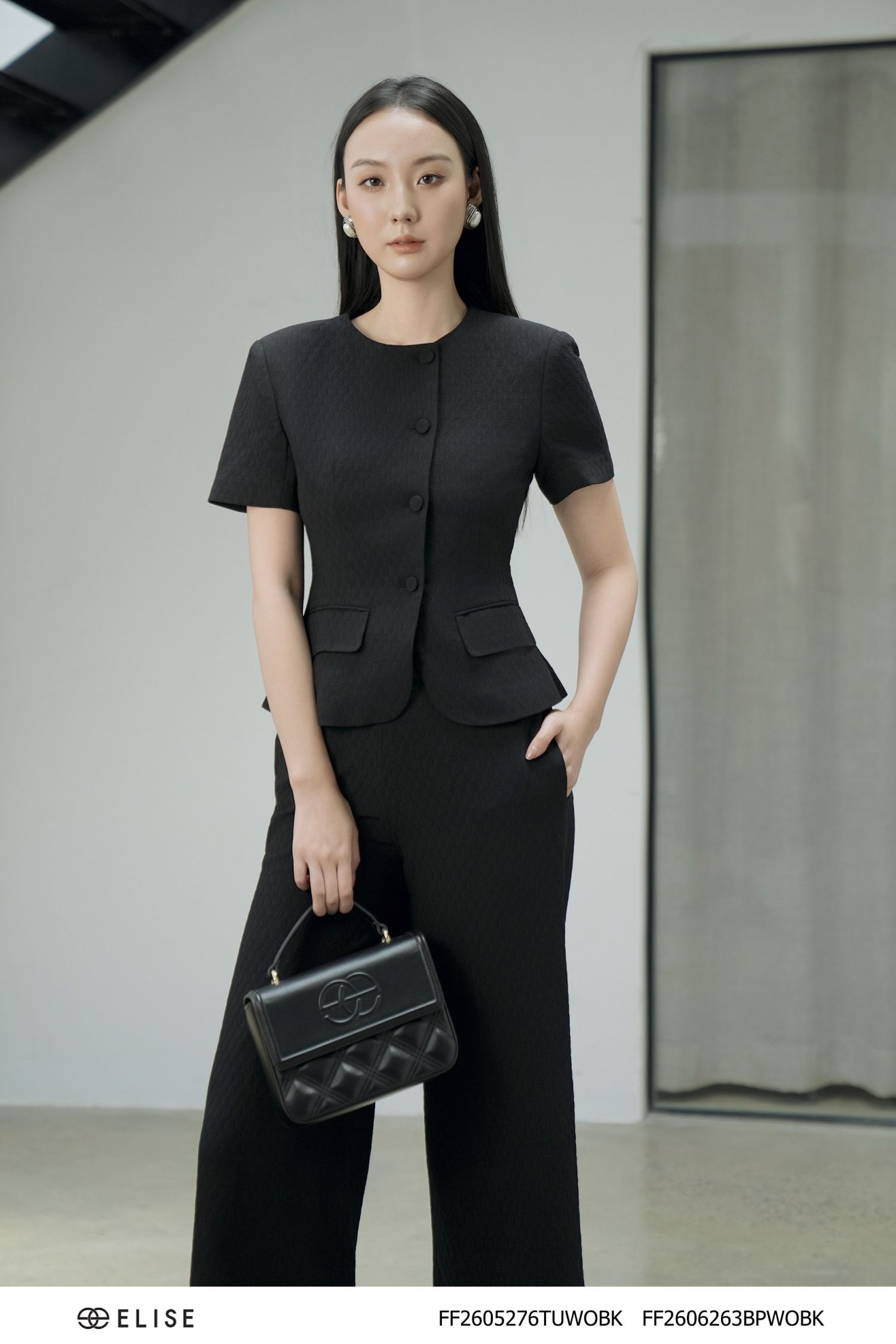 VEST ĐEN CỔ TRÒN NẮP TÚI