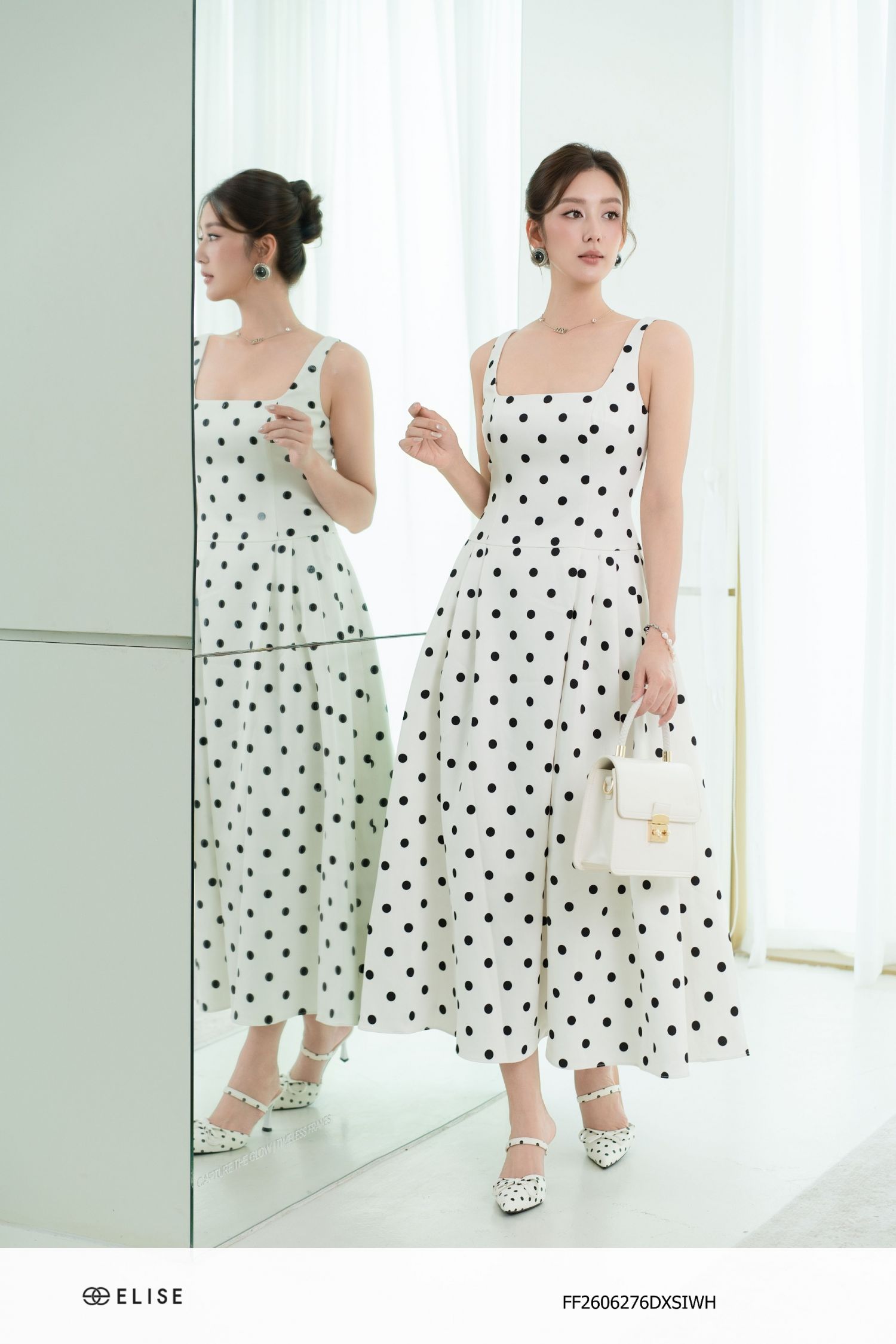 ĐẦM LỤA TRẮNG CHẤM BI XẾP LY EO