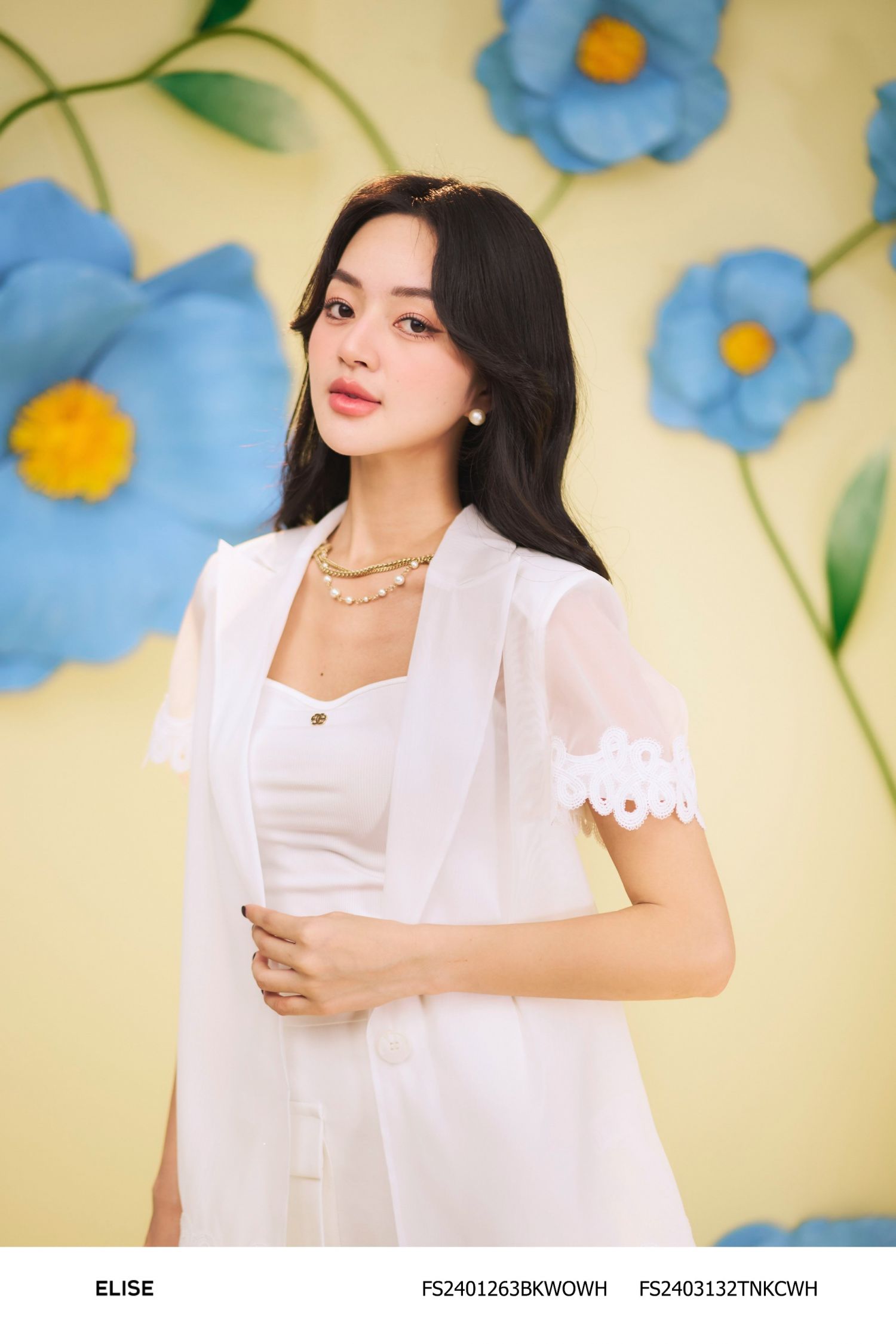 JUPE TRẮNG TÚI ỐP LỆCH