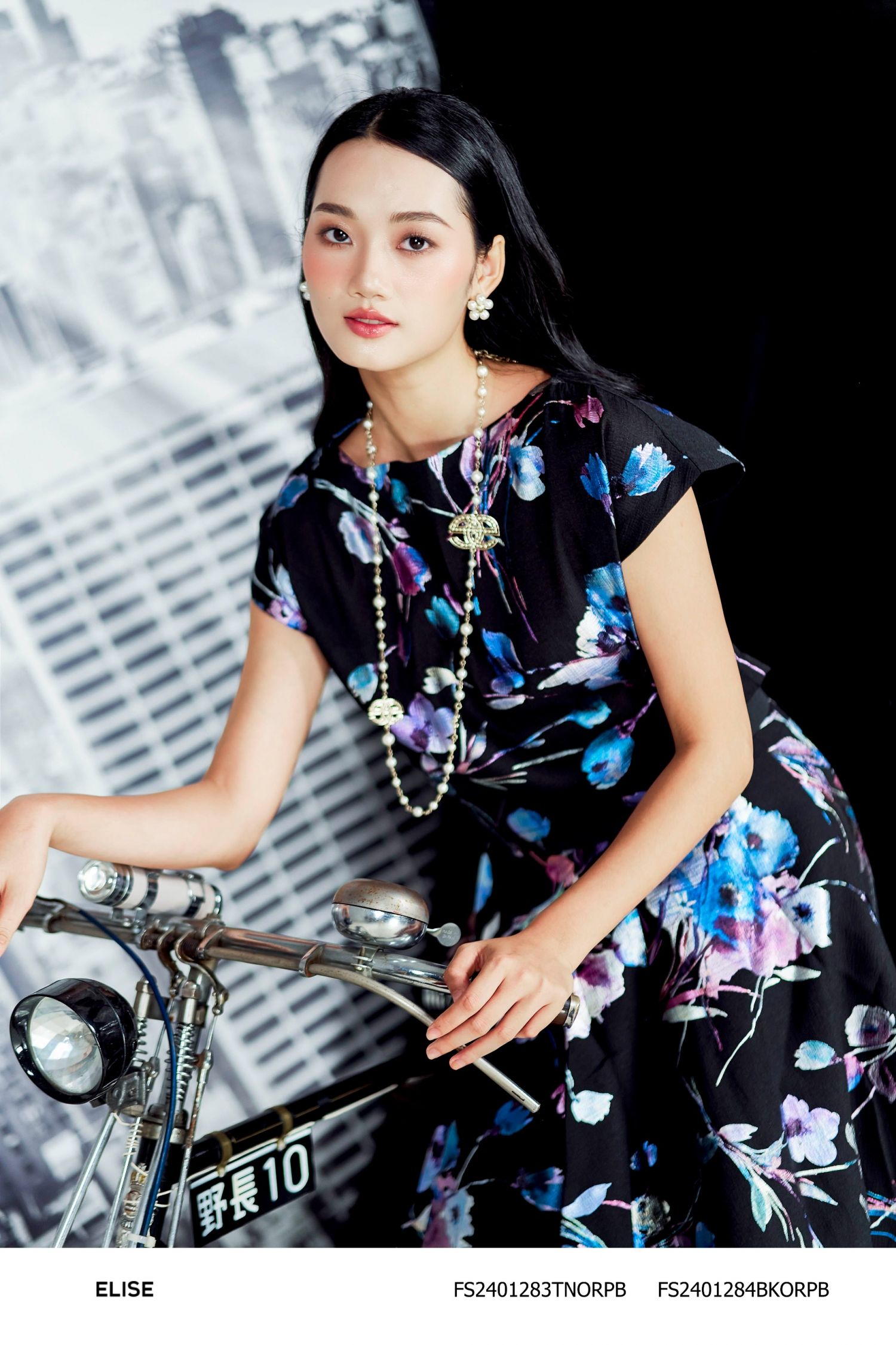 CHÂN VÁY XÒE TƠ XỐP ĐEN HOA TÍM