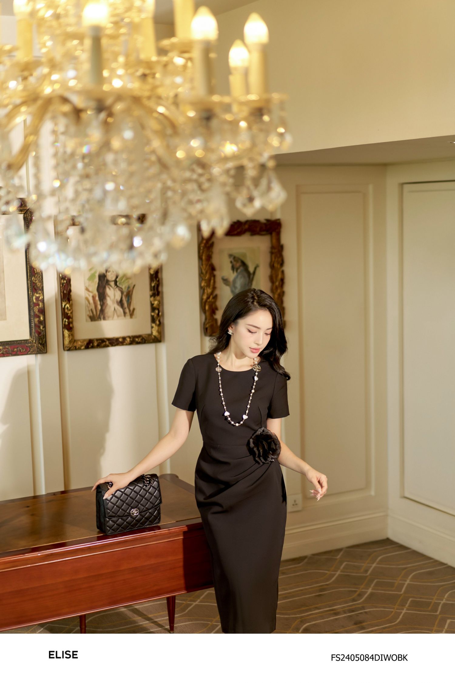 ĐẦM ĐEN NHÚN LY SƯỜN ĐÍNH HOA TƠ