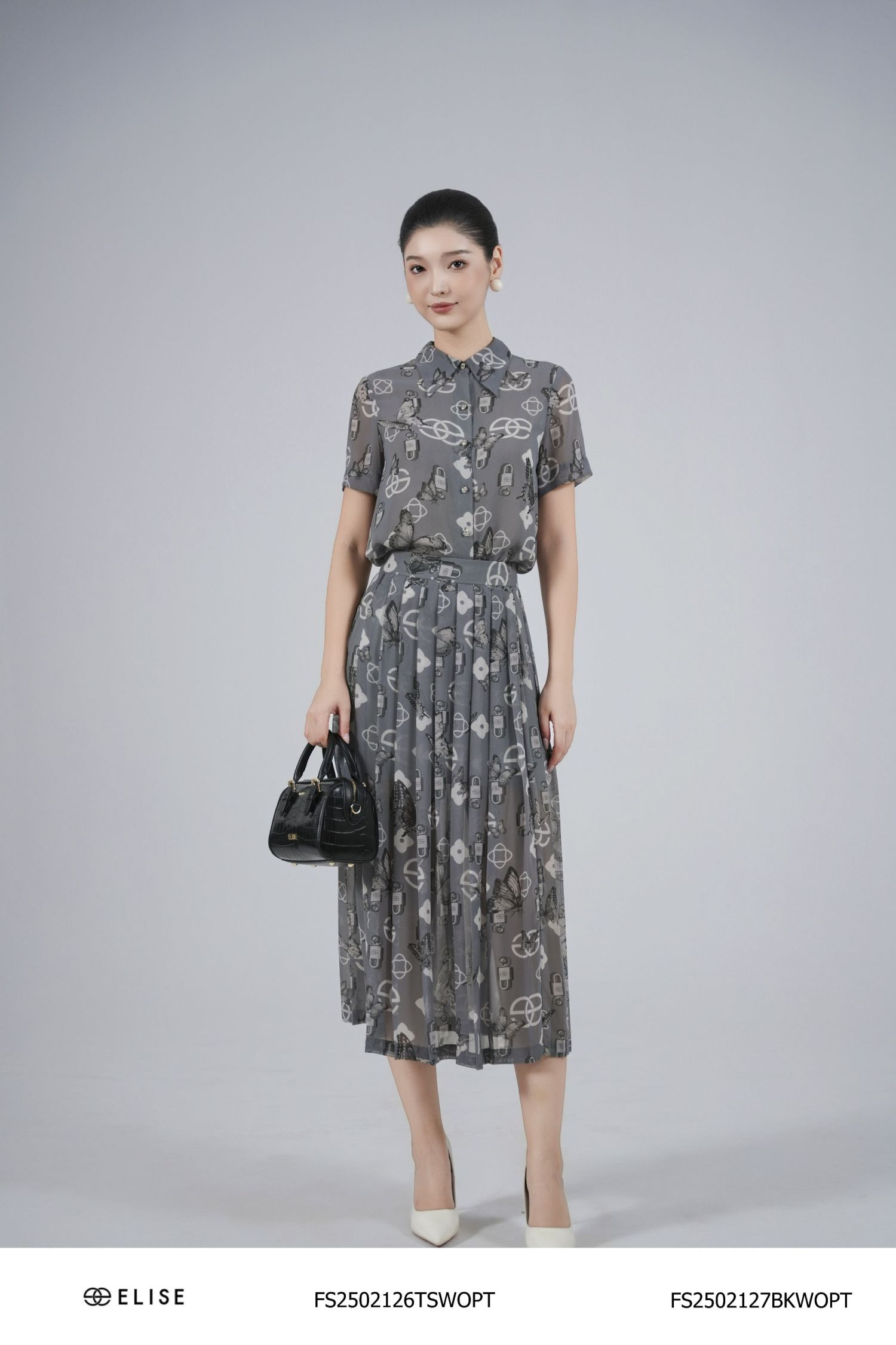 SM CHIFFON HT LOGO NỀN GHI CỔ ĐỨC