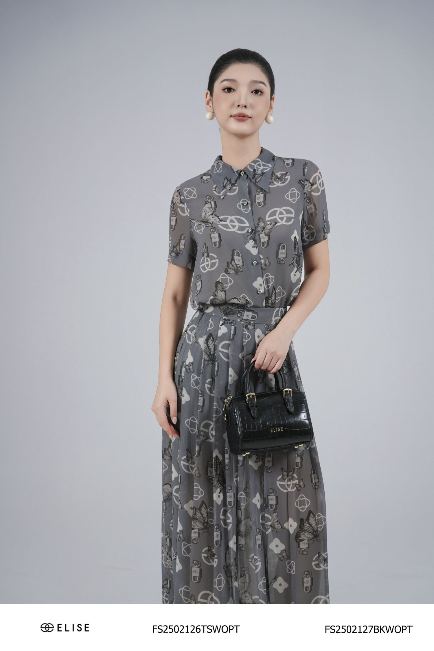 SM CHIFFON HT LOGO NỀN GHI CỔ ĐỨC