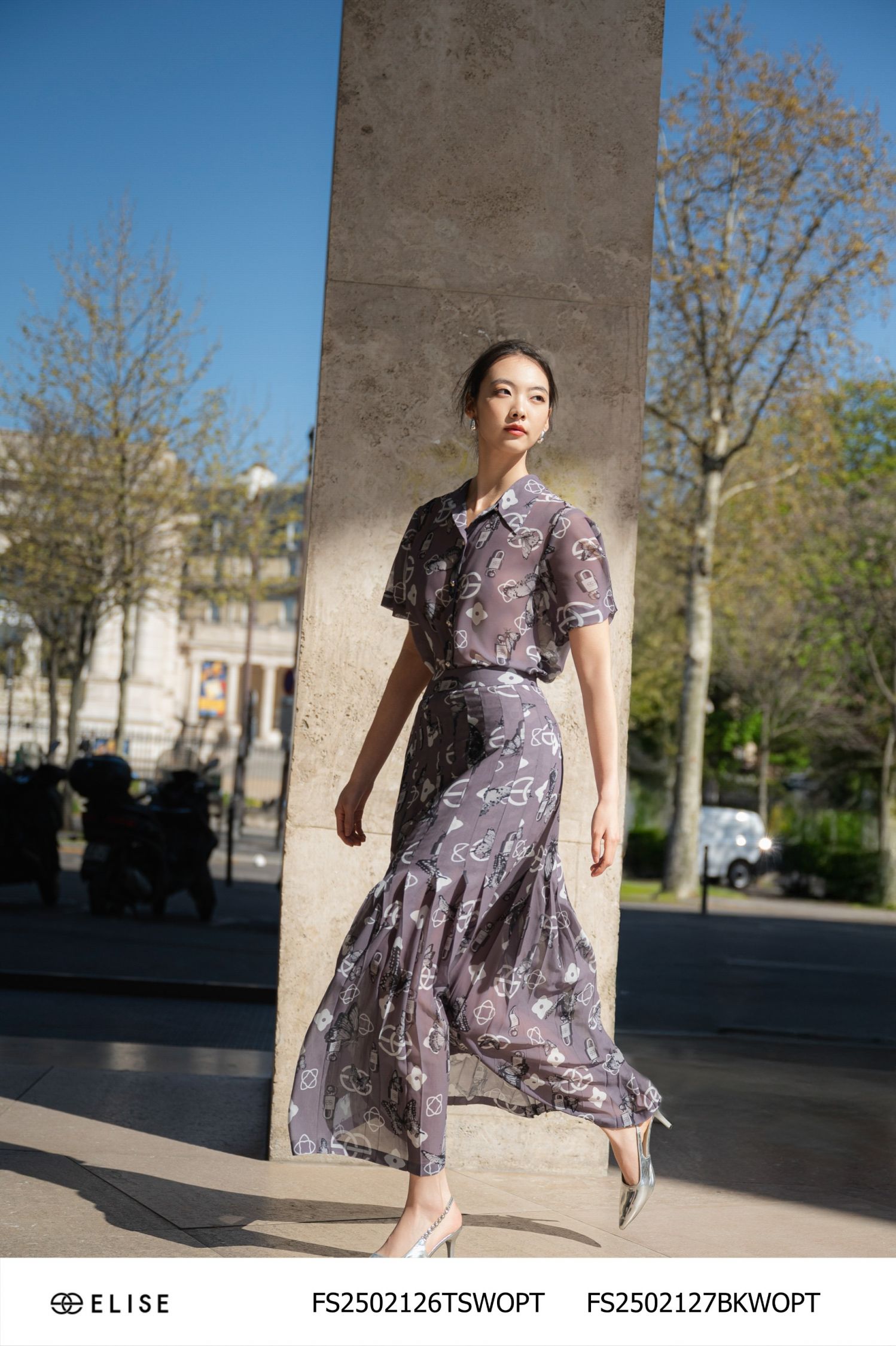SM CHIFFON HT LOGO NỀN GHI CỔ ĐỨC