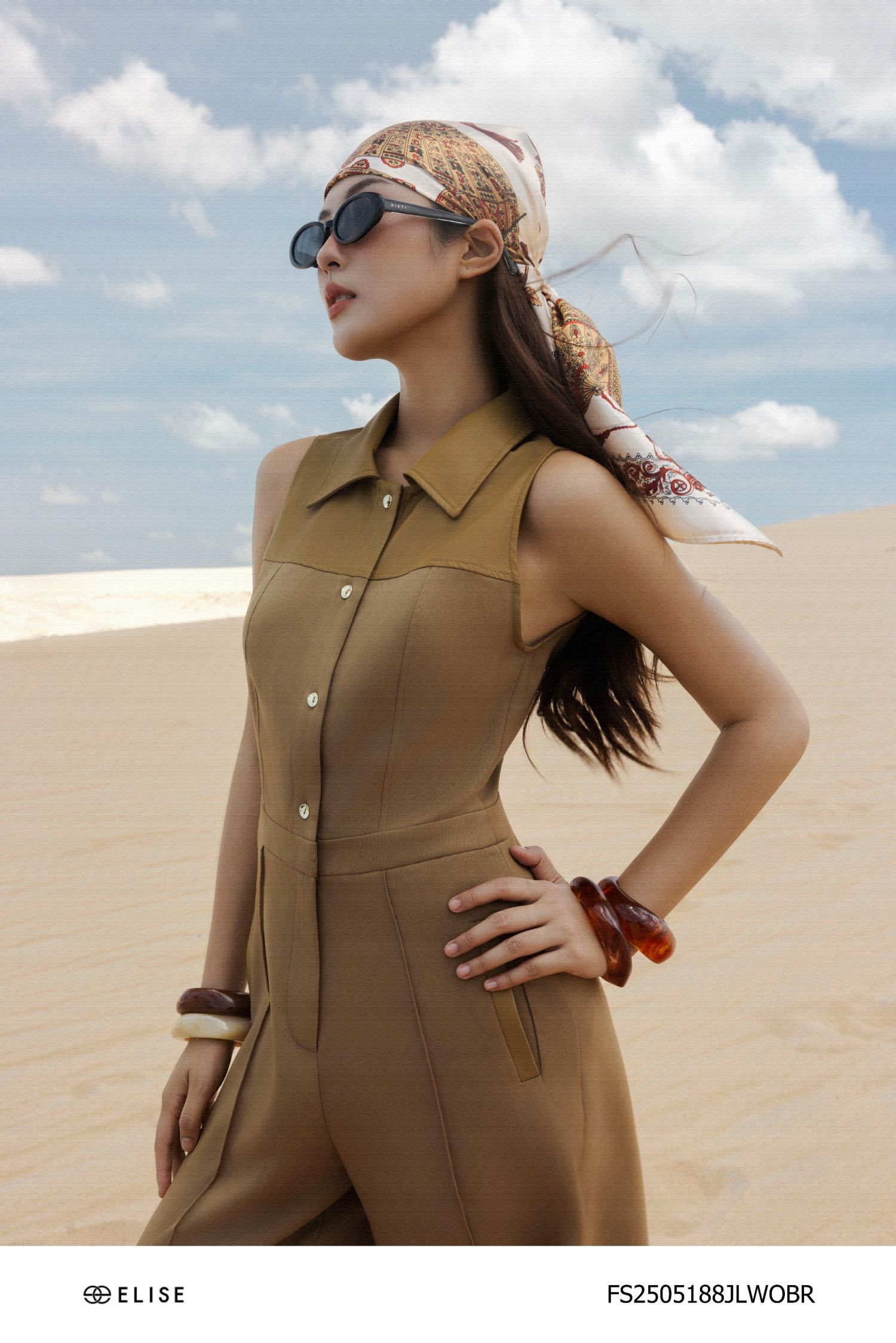 JUMPSUIT NÂU DÀI PHỐI DA