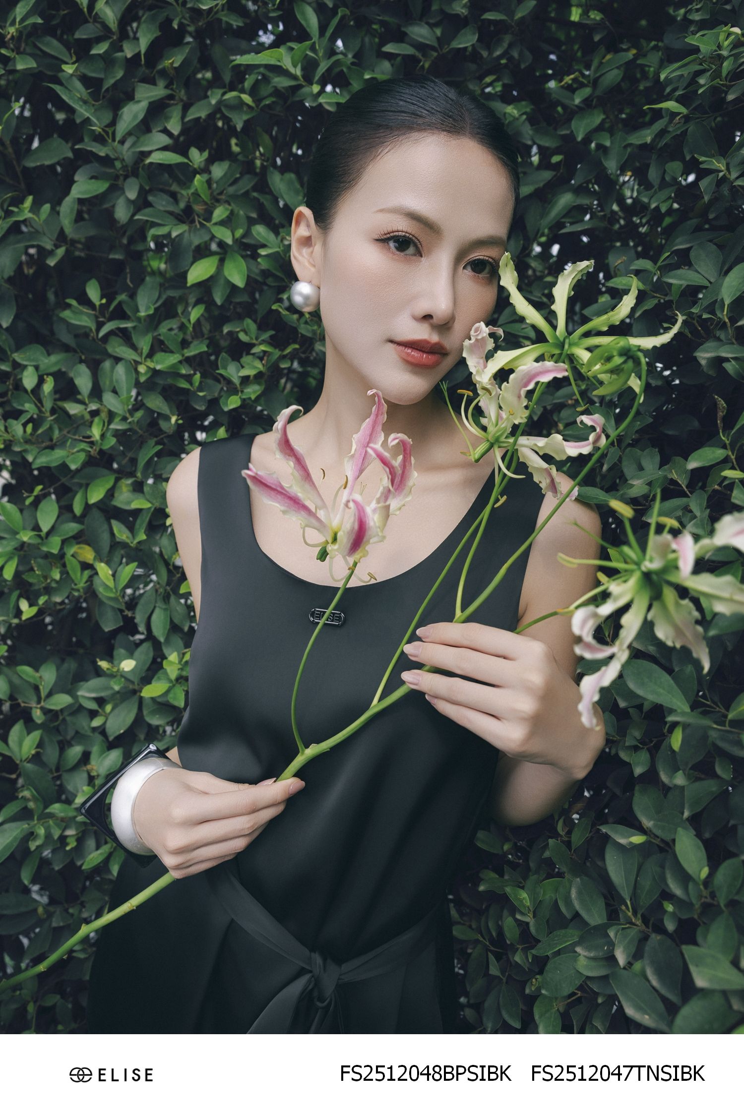 ÁO LỤA ĐEN SÁT NÁCH XẺ TÀ DÂY ĐAI