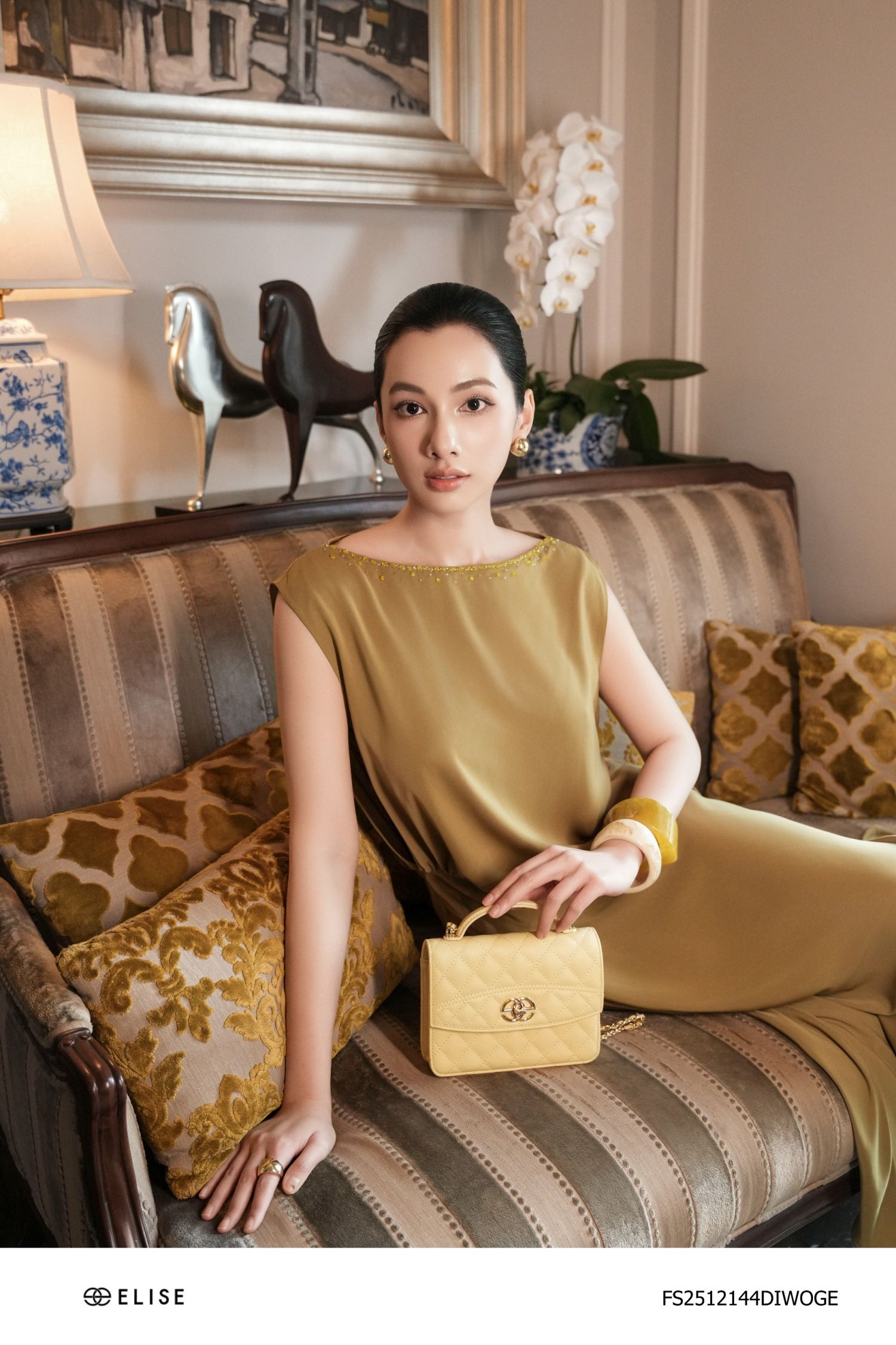 ĐẦM TUYTSY LỤA XANH OLIU VẠT CHÉO BÊN