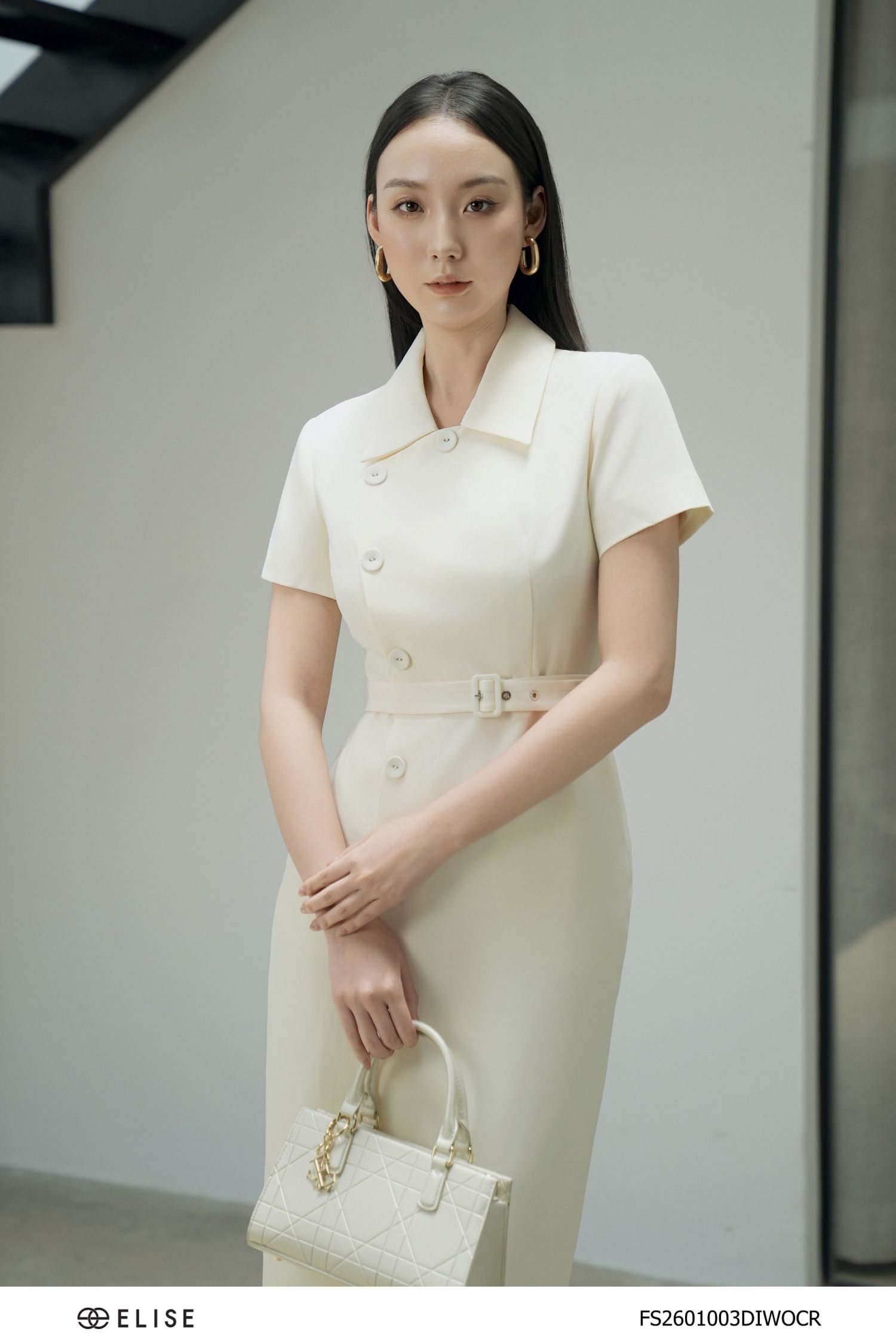 ĐẦM TUYTSY KEM XẺ SAU ĐAI EO