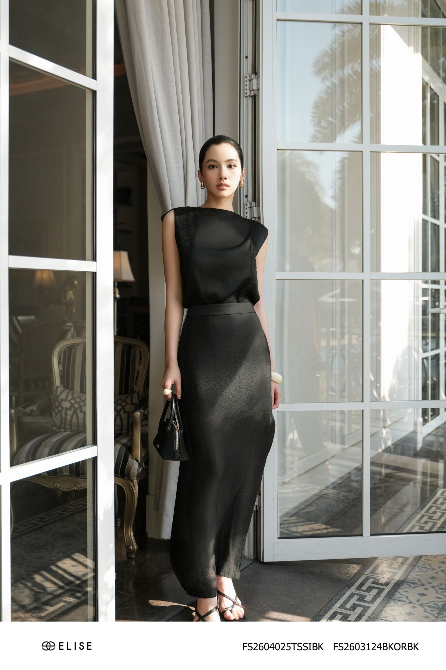 JUPE TƠ ĐEN XẺ BÊN