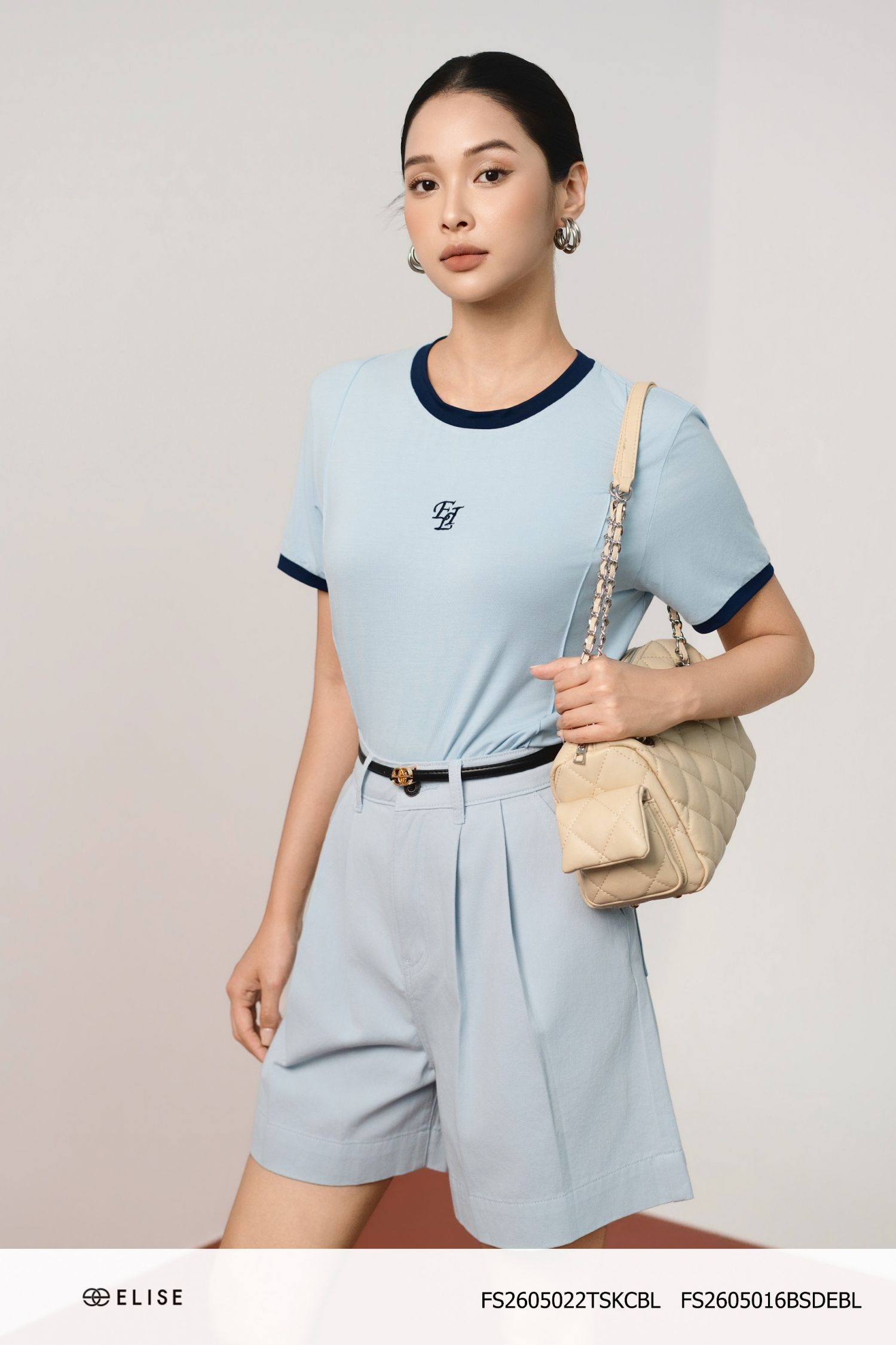 ÁO THUN XANH PHỐI CỔ TAY TÍM THAN