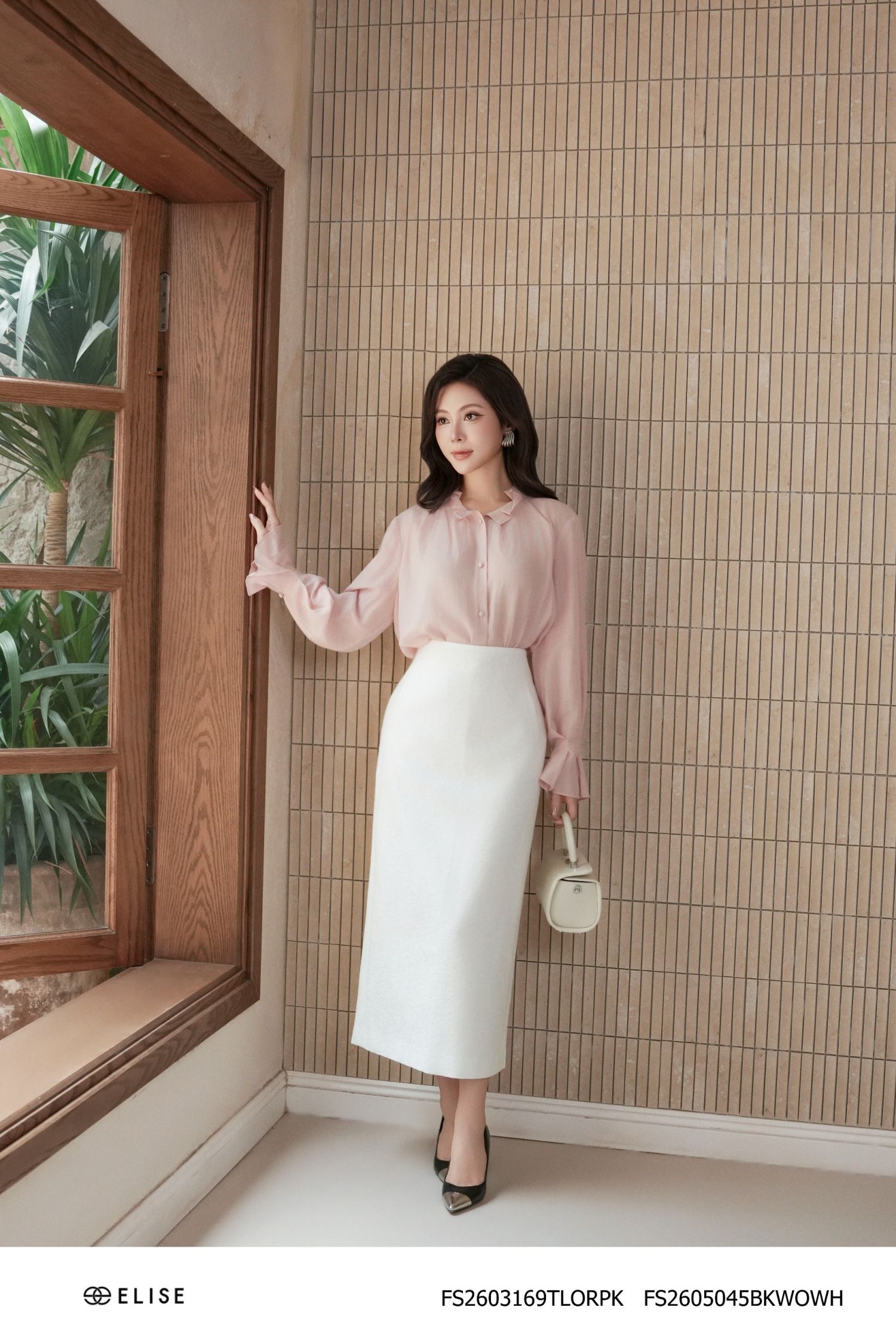JUPE GẤM KT TRẮNG XẺ SAU