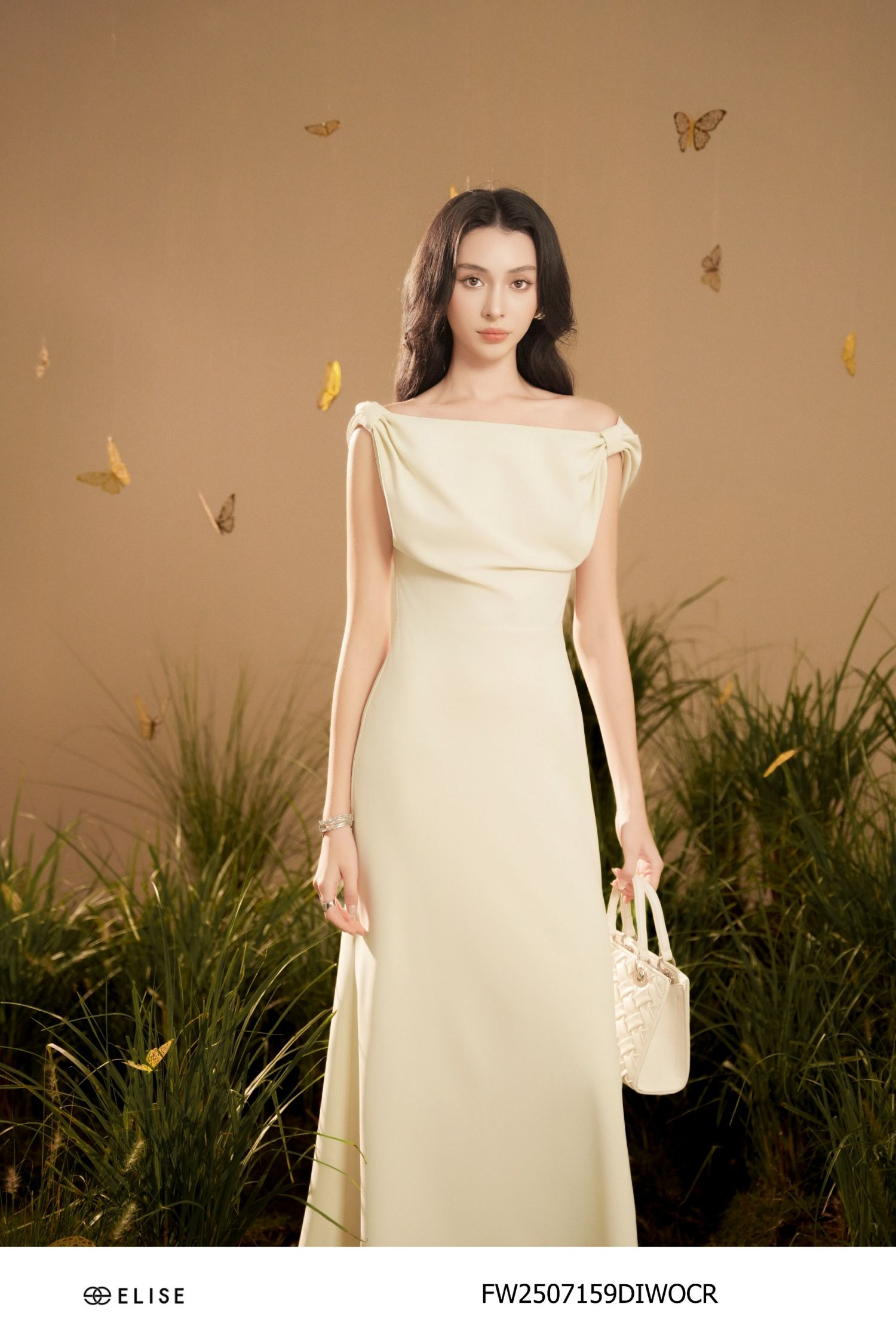 ĐẦM TUYTSY KEM TRỄ VAI